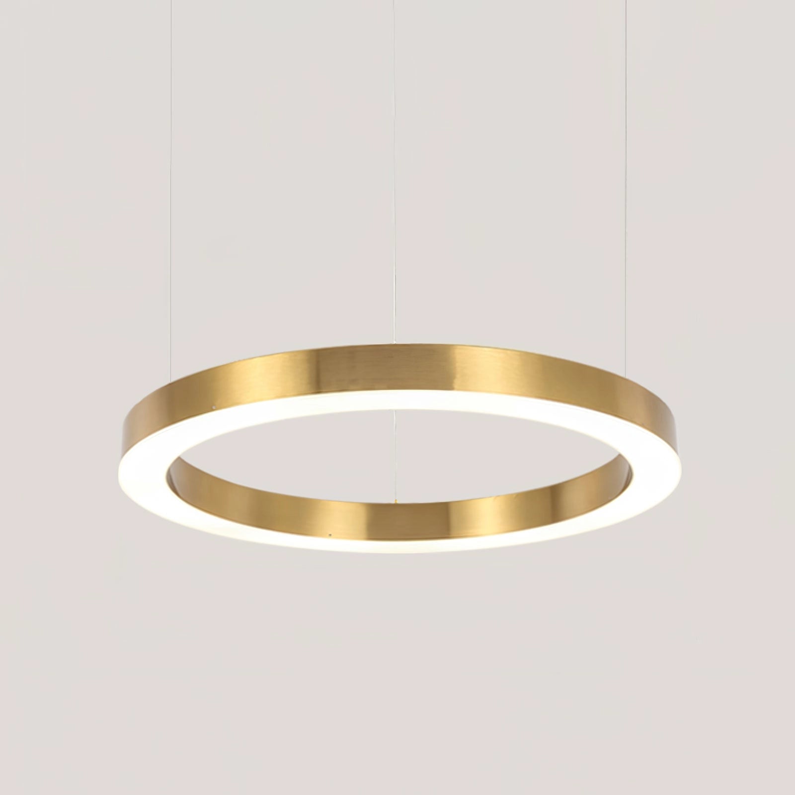 A modern circular LED ring pendant light with a diameter of 39.4 inches (100 cm) designed for luxury hotel lobby lighting, featuring a sleek metallic finish and emitting a cool light.