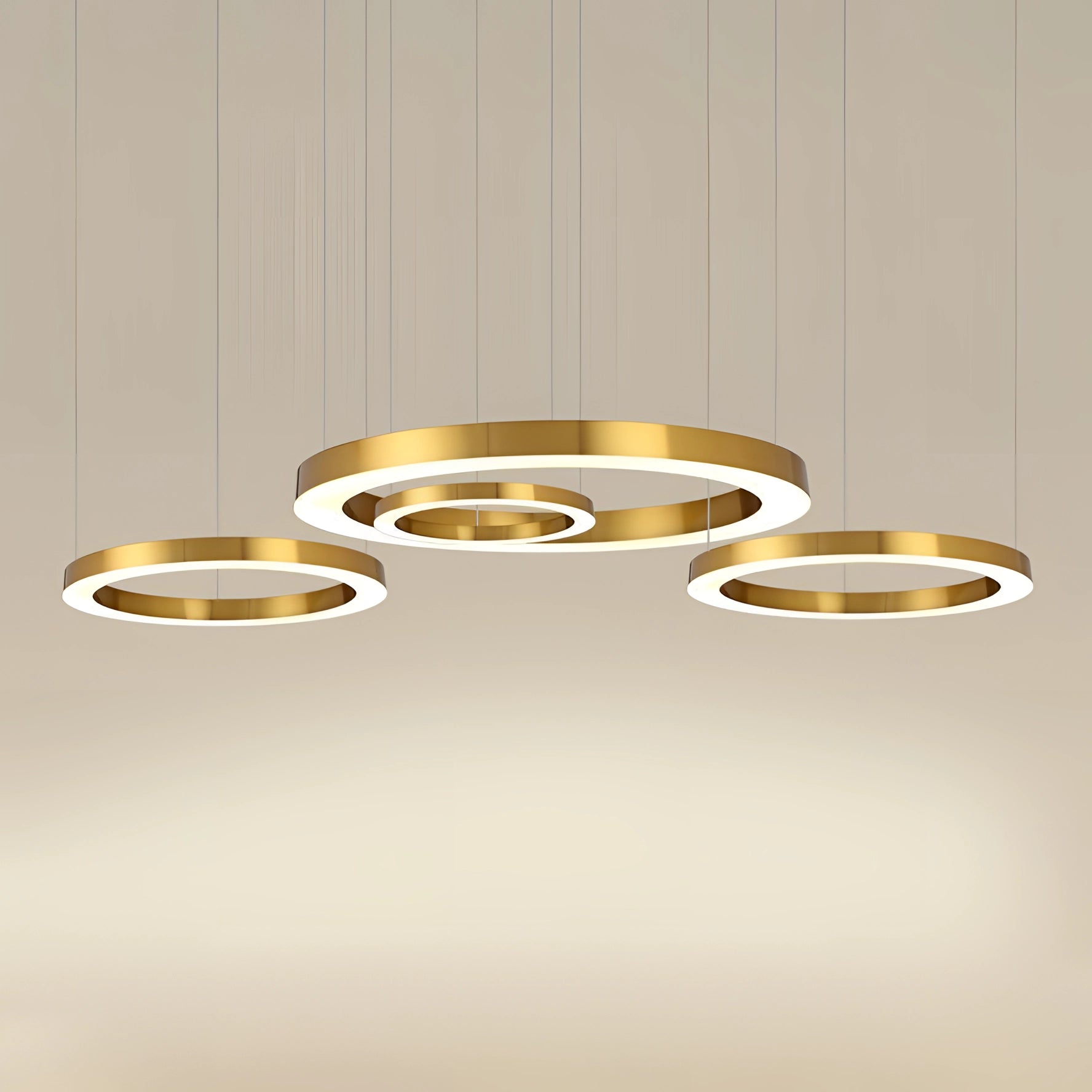 Modern circular LED ring pendant light with a luxurious gold finish, designed for hotel lobbies. The light features an elegant, amber glow and is constructed with a blend of metal and wood materials. The circular design includes a sleek rim detail, adding a sophisticated touch to any upscale event space.