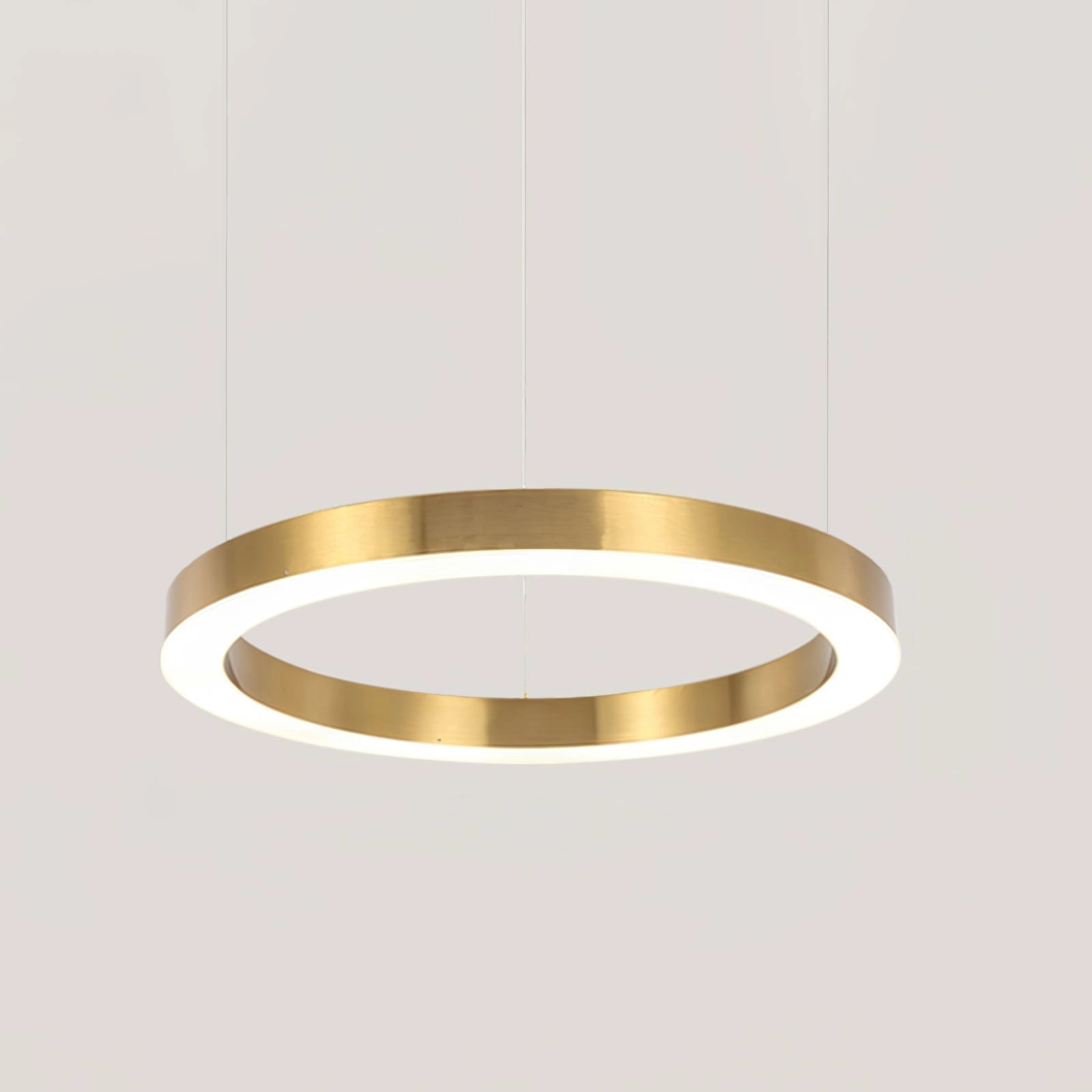 
A modern circular LED ring pendant light featuring a sleek, minimalist design with a diameter of 80 cm, emitting a cool light. Perfect for luxury hotel lobbies, the pendant light showcases a smooth circular form with a metallic finish, adding a touch of contemporary elegance to any setting.