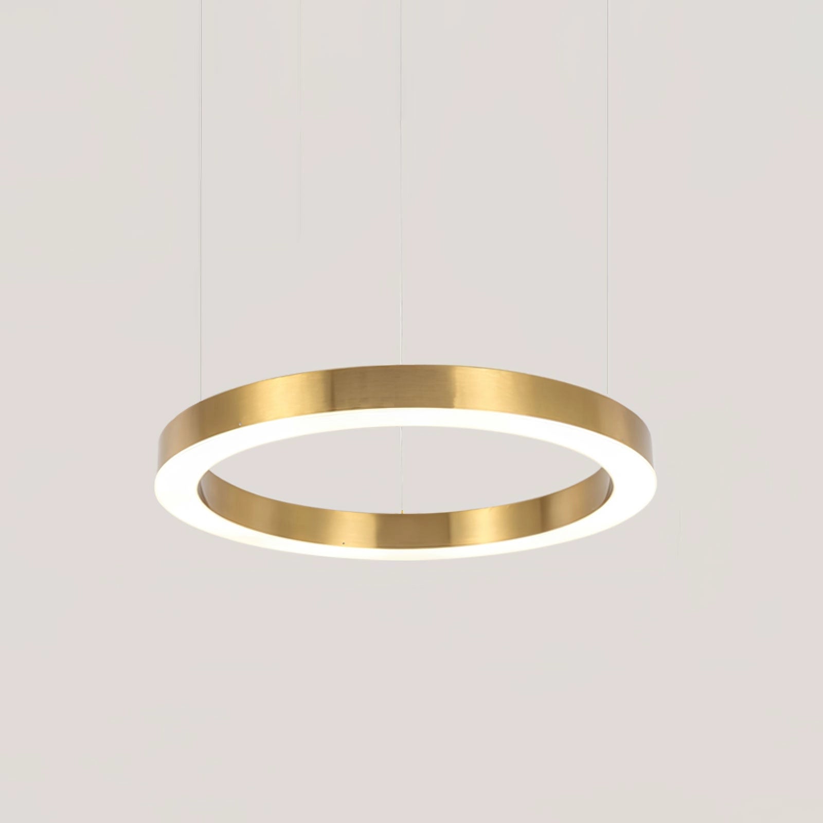 A modern circular LED ring pendant light with a diameter of 70 cm, featuring a sleek metal design and cool light, ideal for luxury hotel lobby lighting.