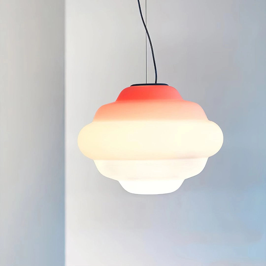 Modern cloud pendant lamp with a two-tone minimalist design in red, featuring a sleek ceiling fixture and a soft ambient glow.