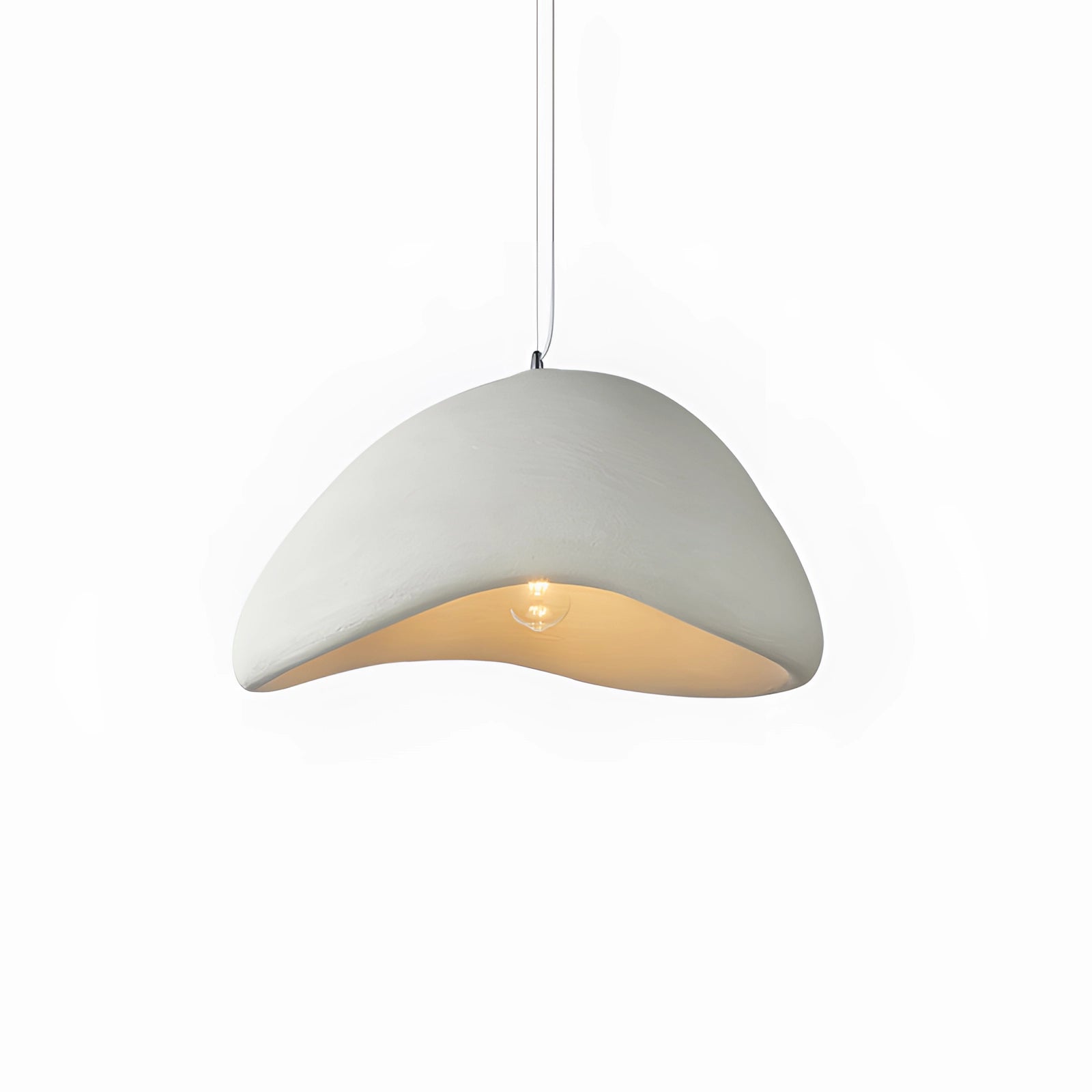 Modern curved pendant light hanging from the ceiling, featuring a minimalist sculptural design with a sleek metal finish.