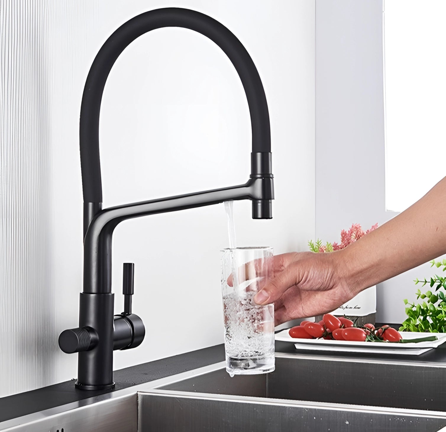 A sleek black and chrome pull-down kitchen faucet with a modern design, featuring dual-functionality suitable for both filling and cleaning tasks. The faucet has a clean, rectangular silhouette and is seamlessly integrated with plumbing fixtures.