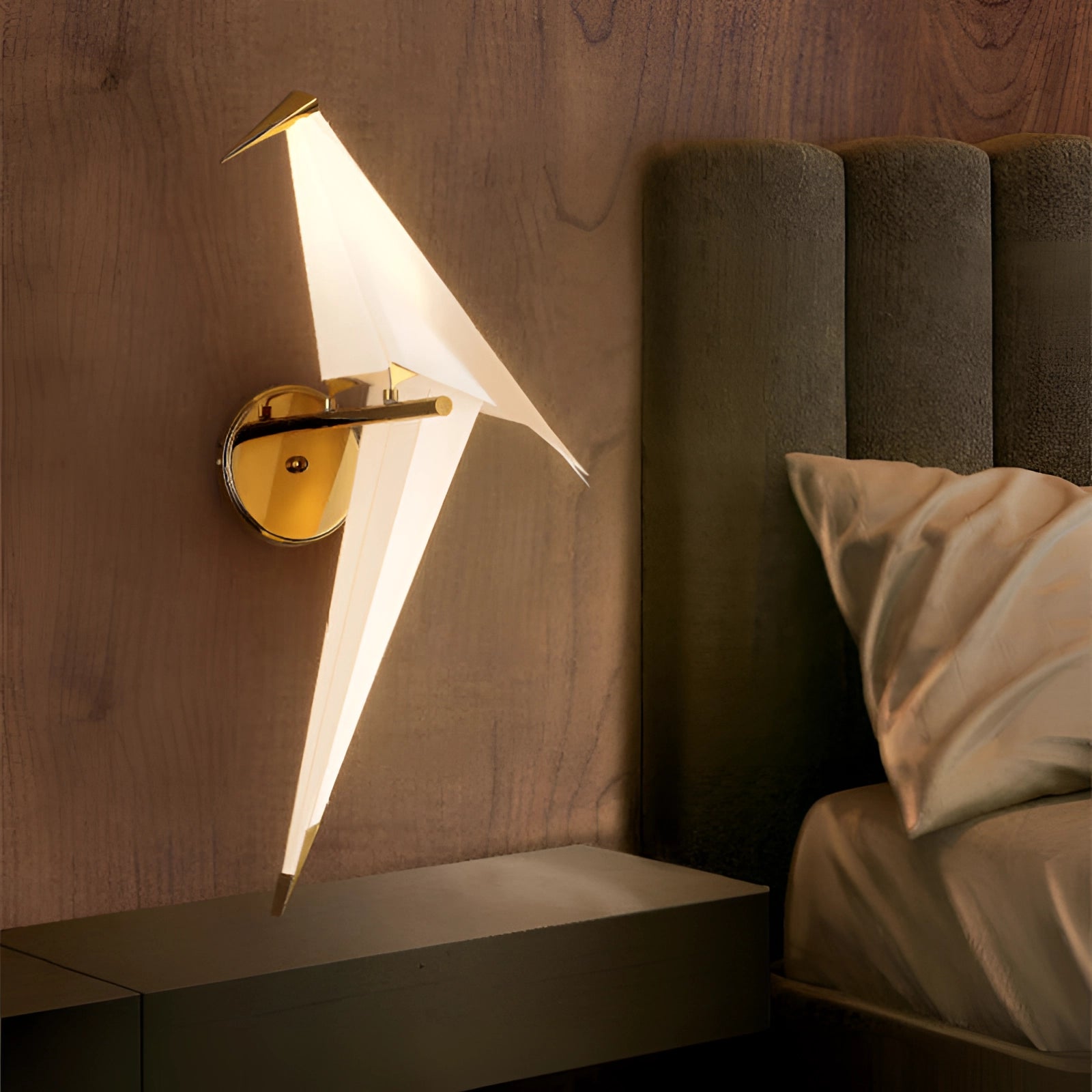 Modern geometric wall sconce with an amber glow and copper accents, mounted on a wooden wall in a stylish interior design setting, providing a warm and comforting ambiance.