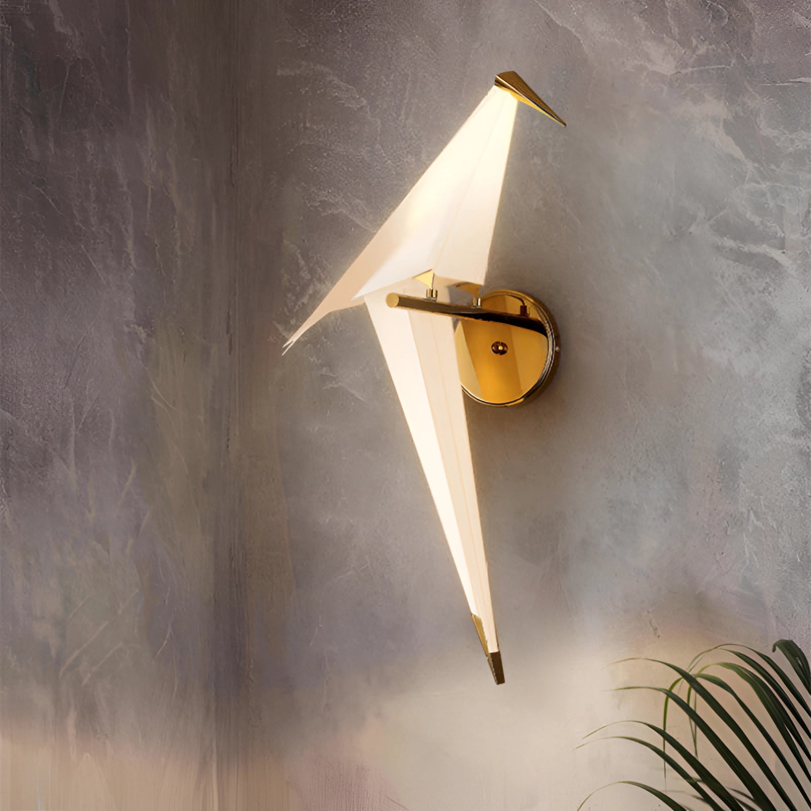 Modern geometric wall sconce with a single light, featuring amber glow and copper accents, designed with a triangular shape and artistic elements.