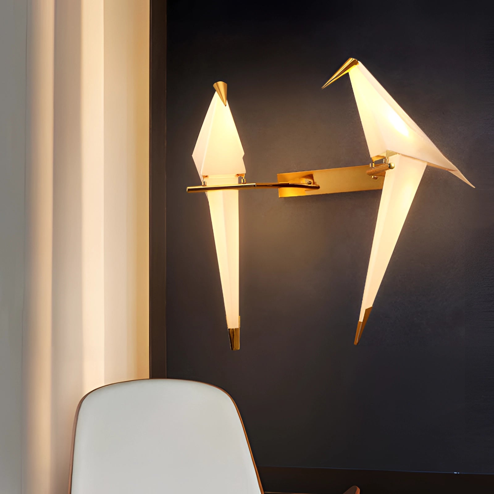 Modern geometric wall sconce with an amber glow, featuring copper accents and a distinctive triangular and rectangular design, complemented by a wooden cone-shaped lampshade.