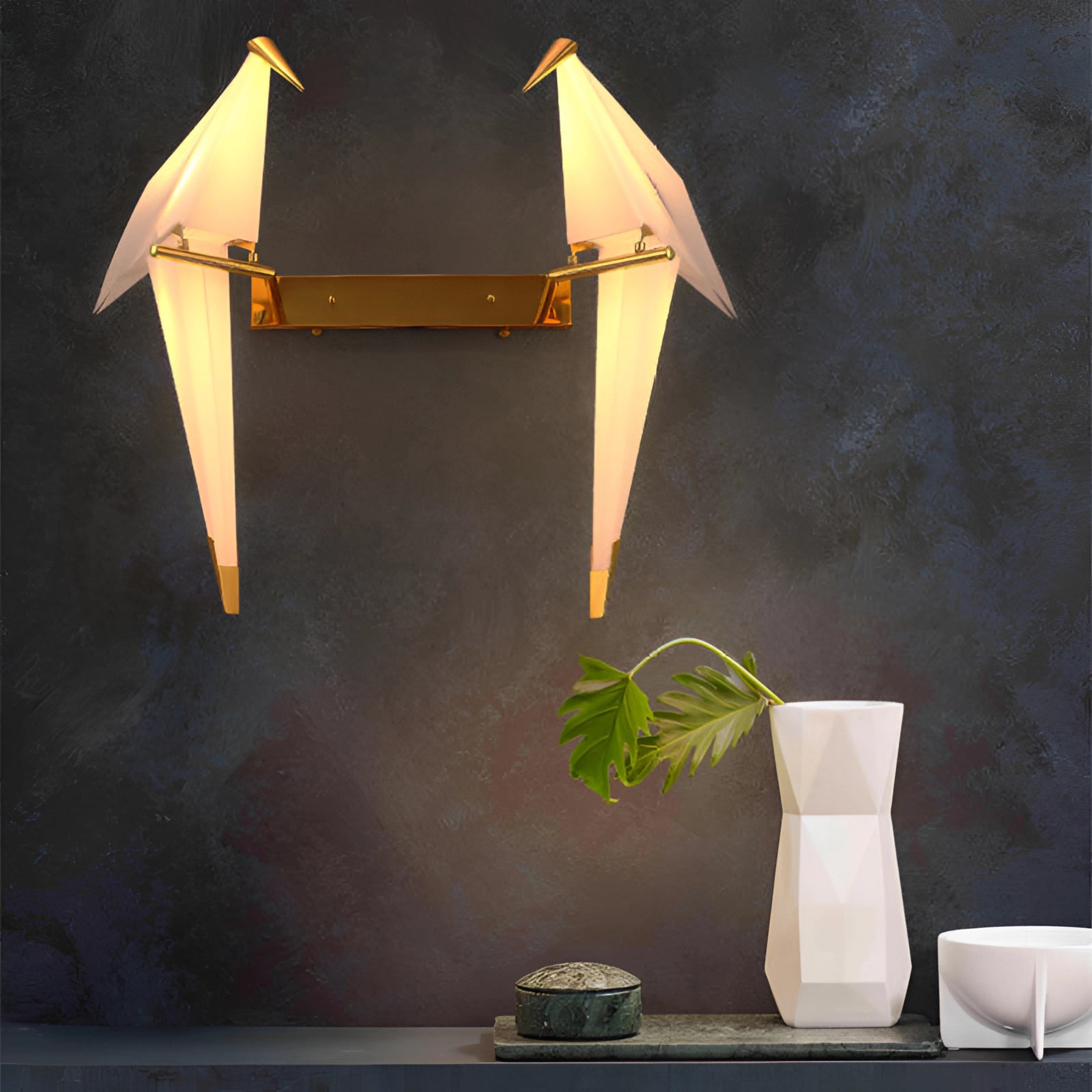 Modern geometric wall sconce with amber glow and copper accents featuring a triangular shape and black and yellow color scheme, highlighted against a wooden backdrop.