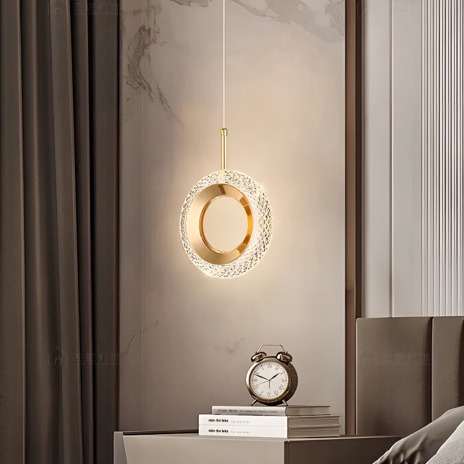 Modern gold LED chandelier with a circular design, featuring a sleek metal and glass construction, elegantly hanging as a luxury designer pendant light.