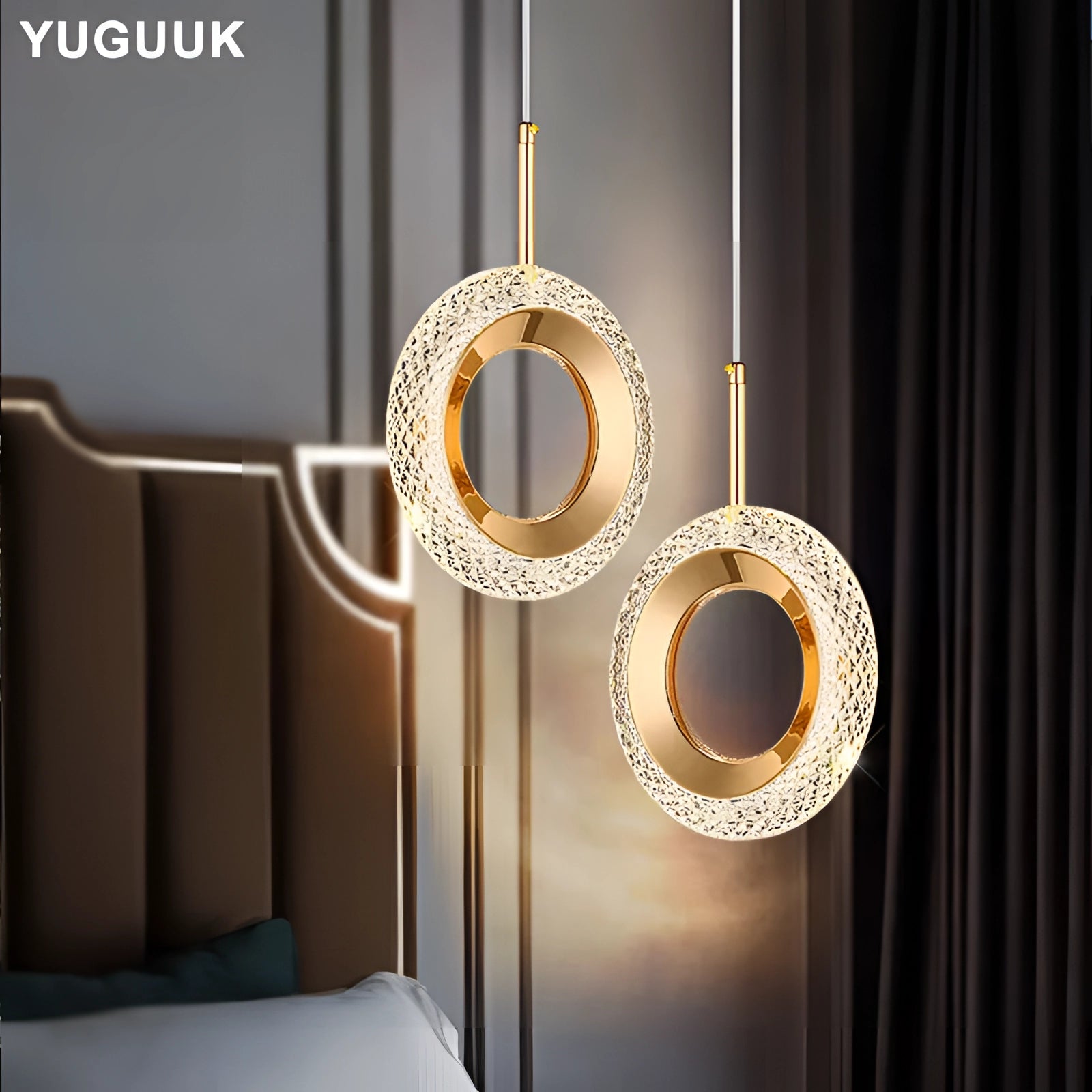 Modern gold LED chandelier with an elegant rectangular design, suspended in a room with wooden flooring and large windows, showcasing its luxurious and sophisticated style as a designer pendant light.