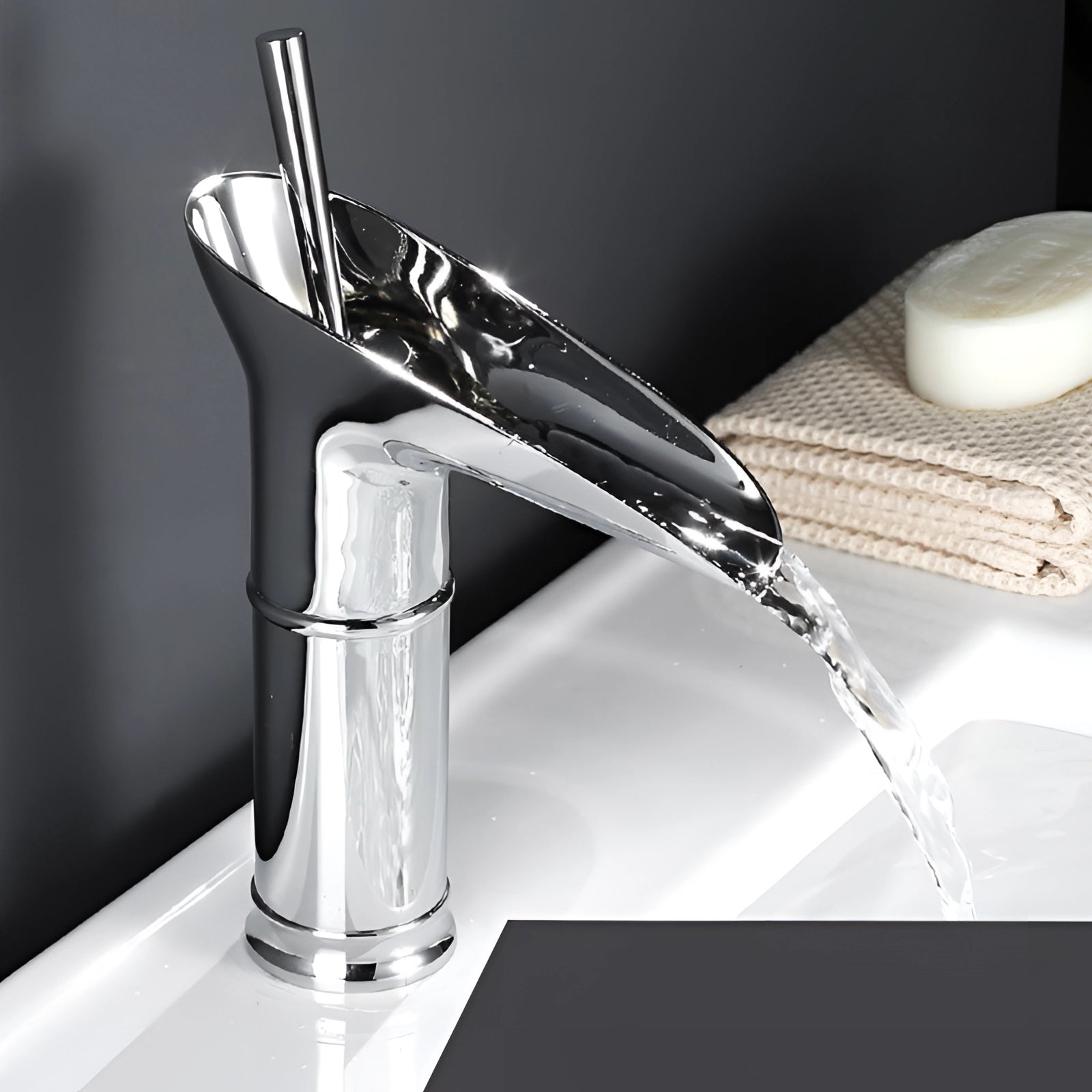 
A luxurious modern gold waterfall faucet with a sleek chromium finish, designed for vessel sinks, featuring a compact and elegant design.