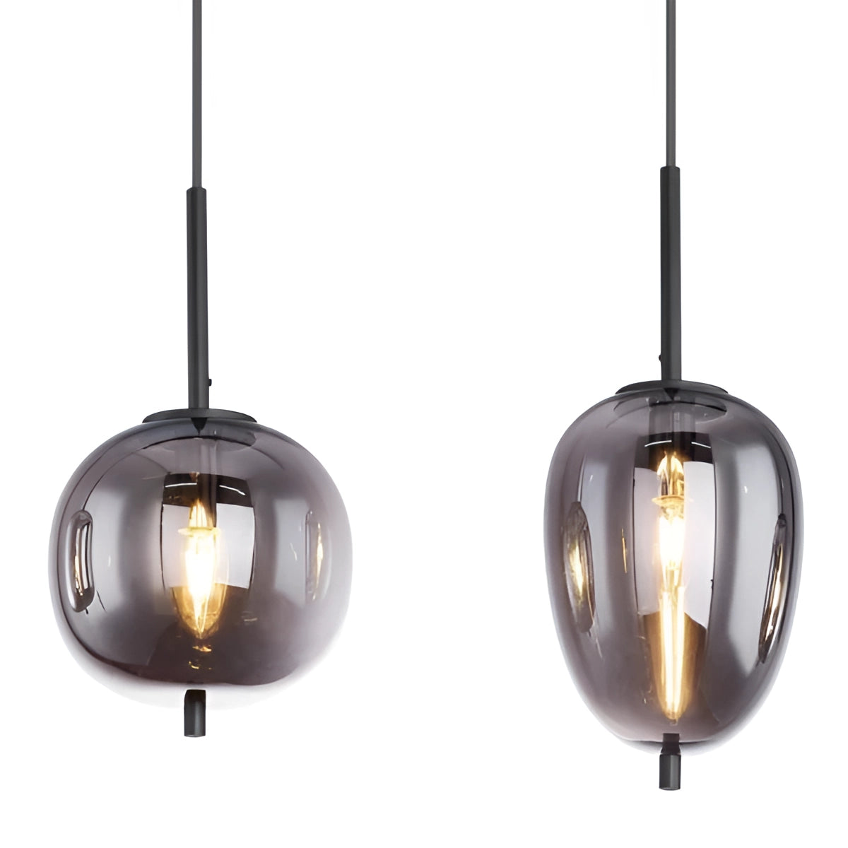 Modern industrial glass pendant light with bronze finish, hanging from ceiling, illuminating dining room decor.