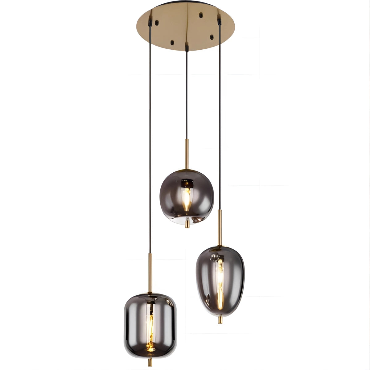 Modern industrial glass pendant lights with smoke gray shades and brass accents, featuring three heads, suspended from the ceiling in a bronze finish, illuminating a dining room decor.