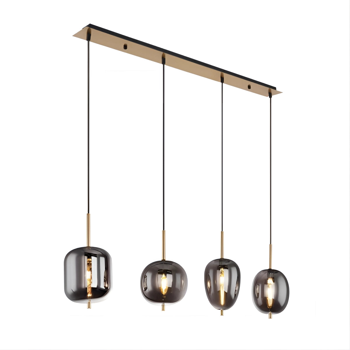 Modern industrial glass pendant lights with a smoke gray shade and brass accents, featuring four heads, hanging from a bronze-finished ceiling fixture in a dining room setting.