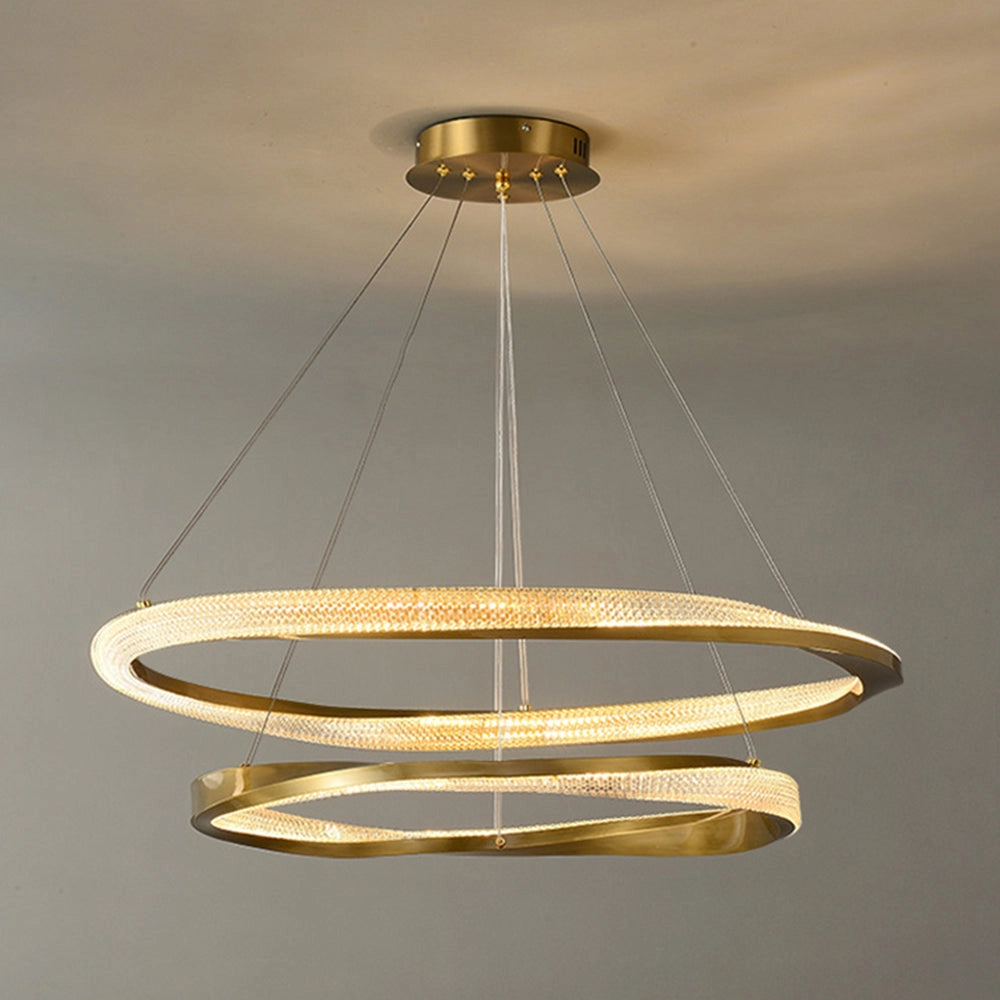 Modern golden LED chandelier with a minimalist pendant light design, featuring a sleek metal structure and warm amber glow, elegantly suspended from the ceiling.