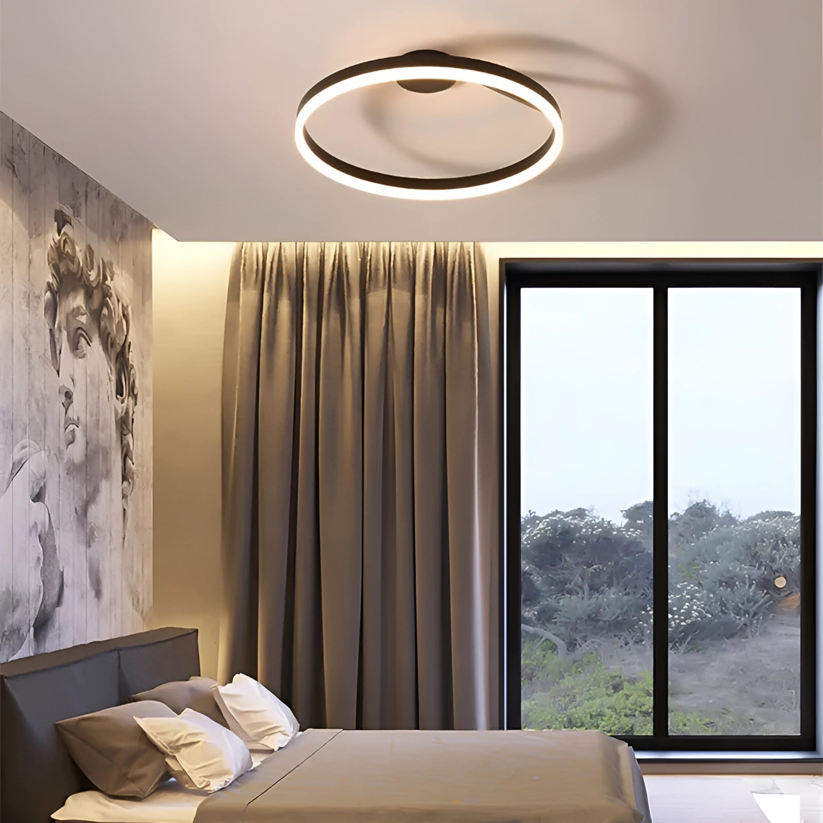 Modern LED circular ceiling light fixture with a sleek, energy-efficient design, illuminating a contemporary interior space with wooden accents and large windows.