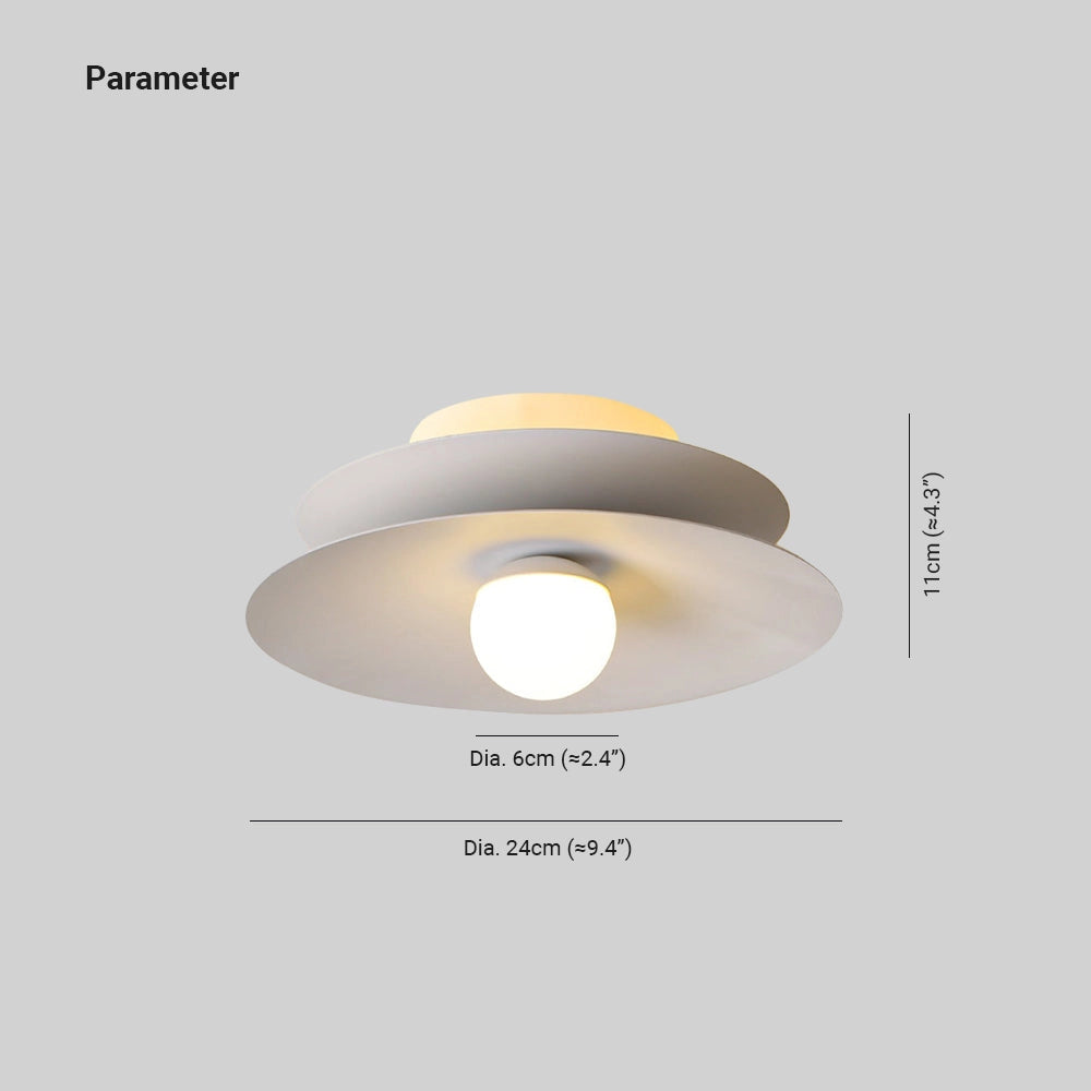 Modern LED disc ceiling light mounted on a ceiling, featuring a minimalist and circular design.