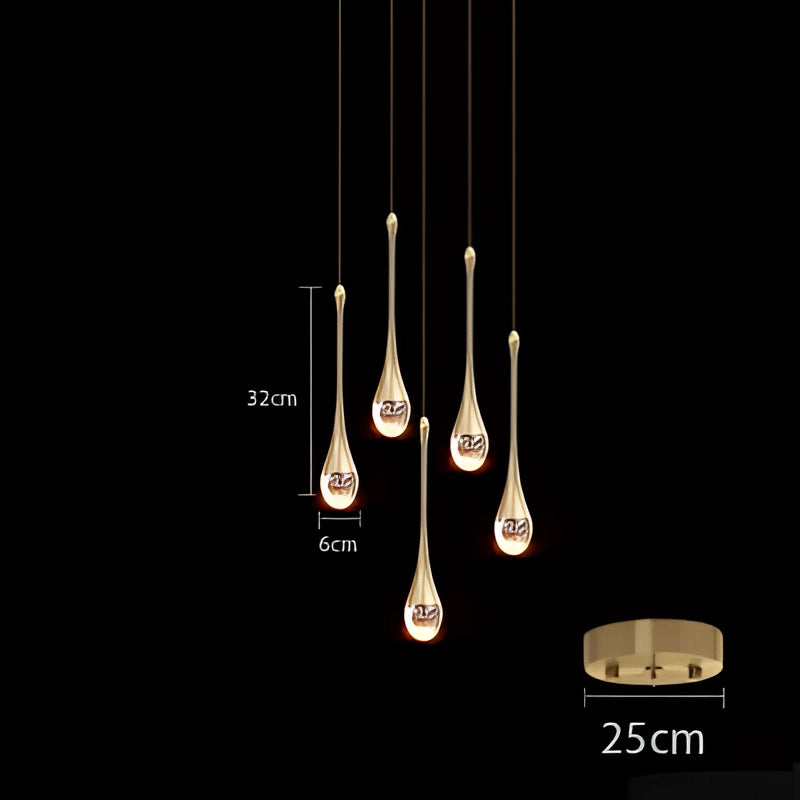 Modern LED gold teardrop pendant lights with a 5-head configuration, emitting a warm white glow, elegantly suspended from the ceiling, showcasing a stylish and artistic design suitable for kitchens and dining rooms.