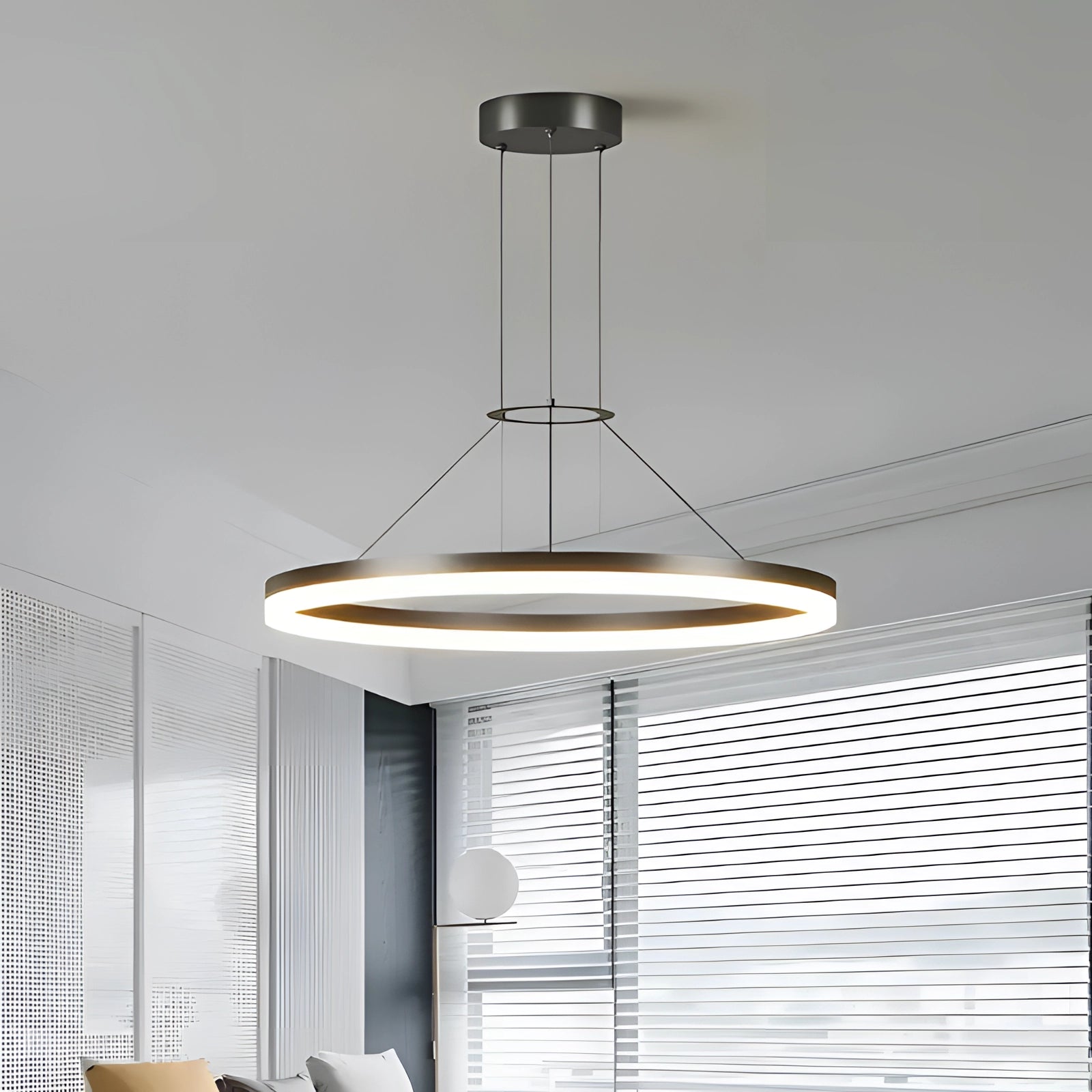 Modern LED pendant light with an adjustable circular ceiling fixture, featuring a sleek design suitable for contemporary interior spaces. The light incorporates elements of wood and metal, casting a warm glow ideal for enhancing architectural aesthetics and interior design ambiance.