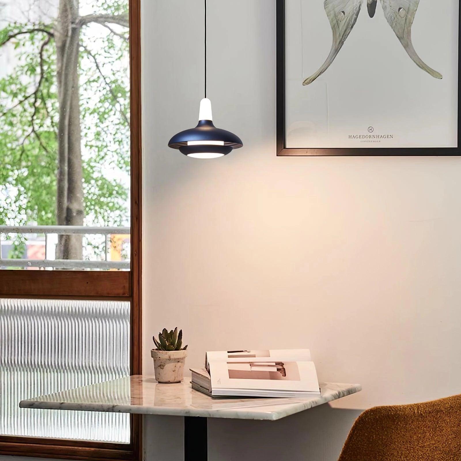 Modern LED pendant light with a sleek minimalistic design, featuring a rectangular white shade, adjustable cord, and wooden elements, displayed in a contemporary interior setting near a window.