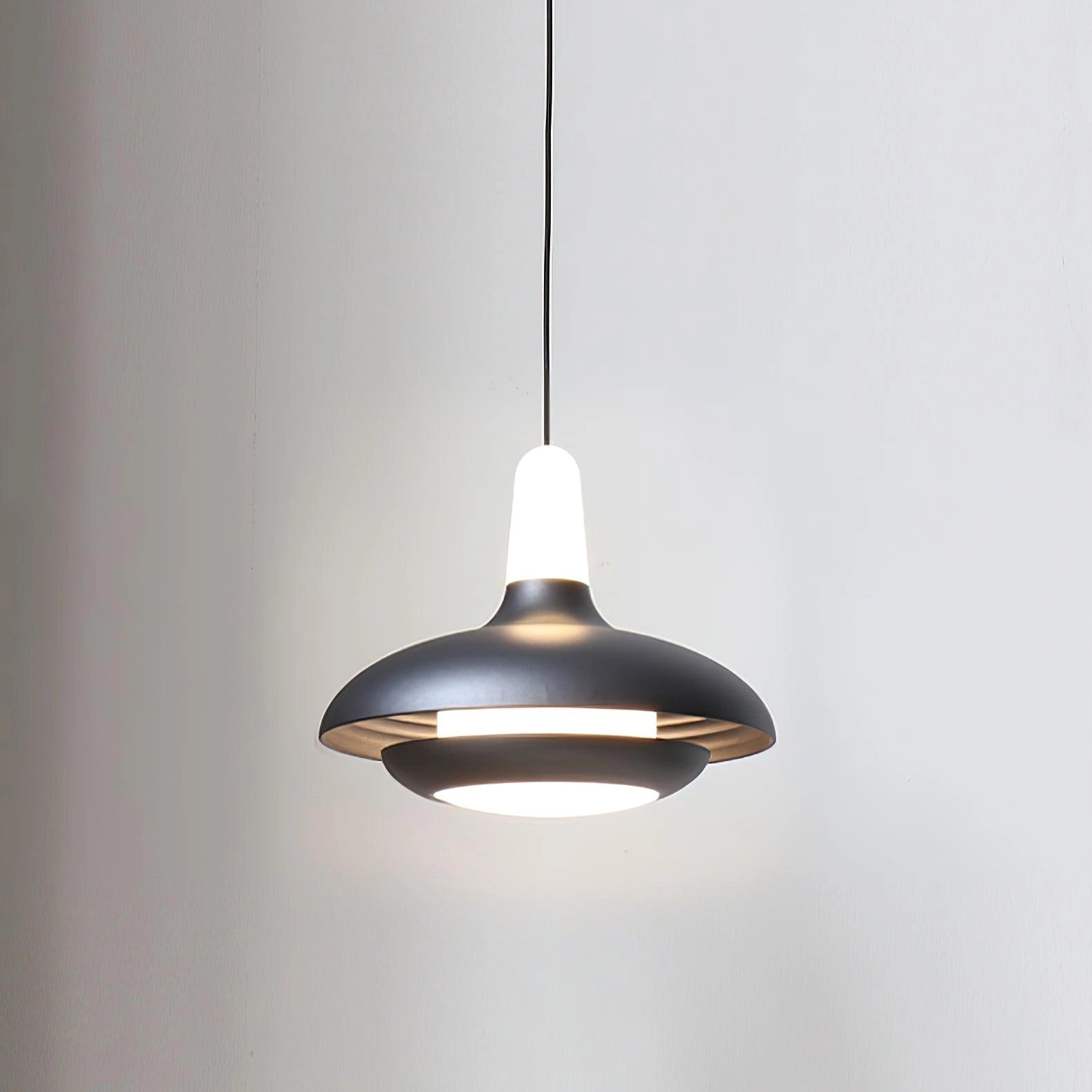 Modern LED pendant light with a sleek, minimalistic design featuring an adjustable cord, metallic finish, and ceiling fixture.