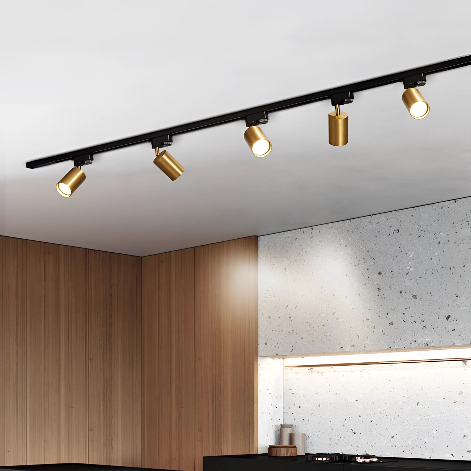 Modern LED track lighting fixture with three adjustable ceiling spotlights in a gold finish mounted on a 39.37-inch rectangular spur, enhancing interior design with its sleek and contemporary style.