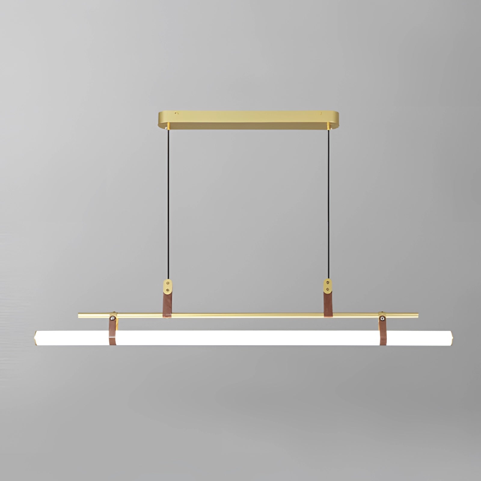 Modern LED tube pendant light with a minimalist design, featuring a large gold metal fixture. The light has a sleek, rectangular form with parallel tubes and a symmetrical arrangement, suitable for kitchens and dining rooms.