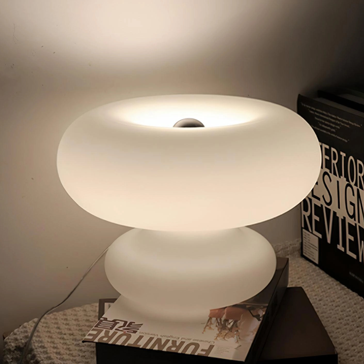 Minimalist Modern Mushroom Table Lamp with a sleek ceramic base and a circular art-inspired design, ideal for bedside or table use.