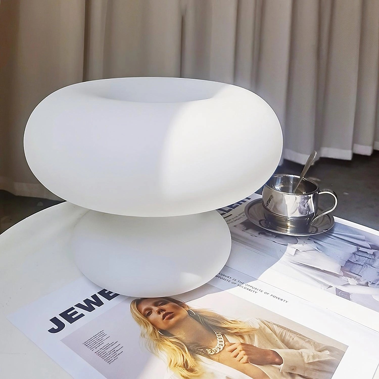 Modern Mushroom Table Lamp on a bedside table with minimalistic design elements.