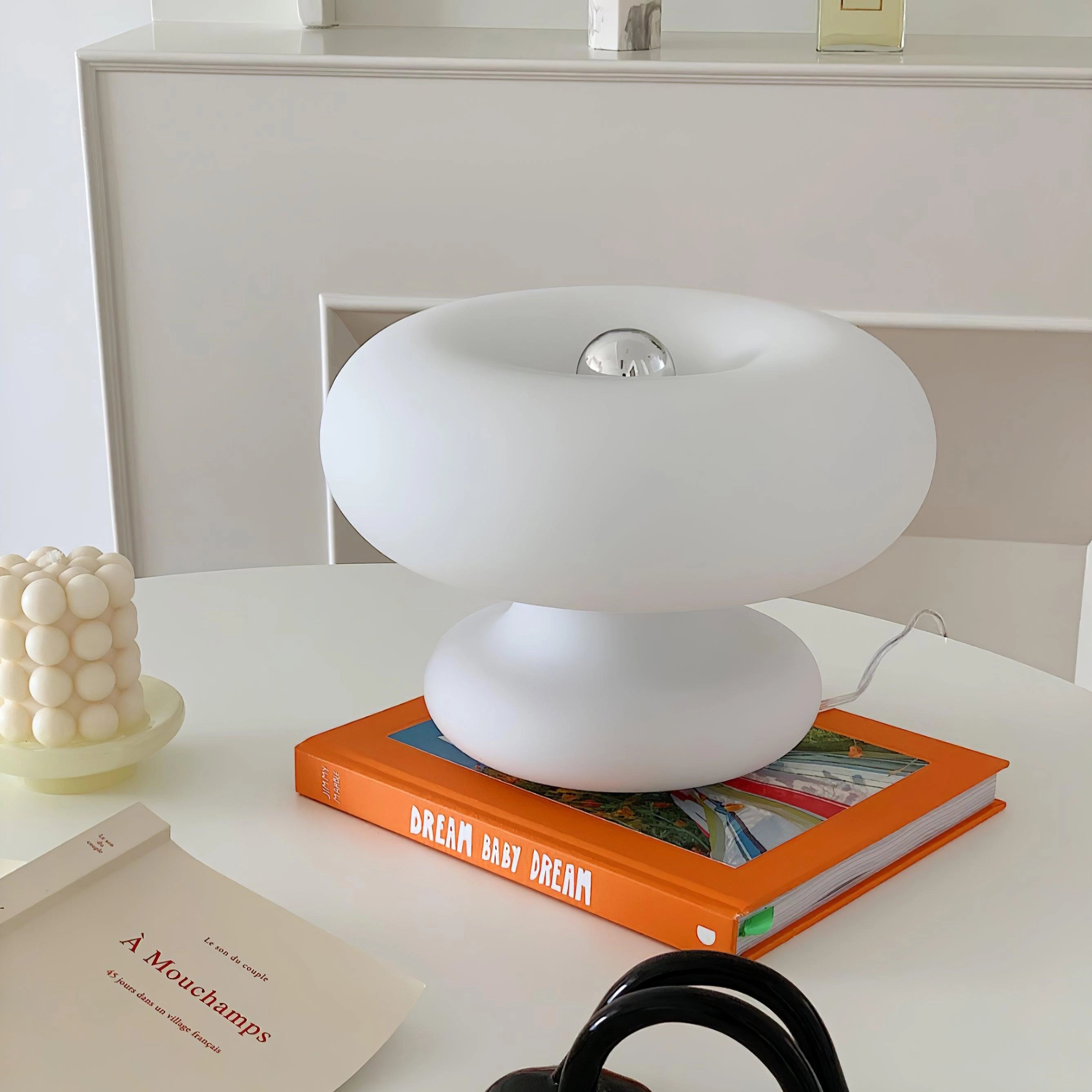 Modern Mushroom Table Lamp with minimalist design on a bedside table.