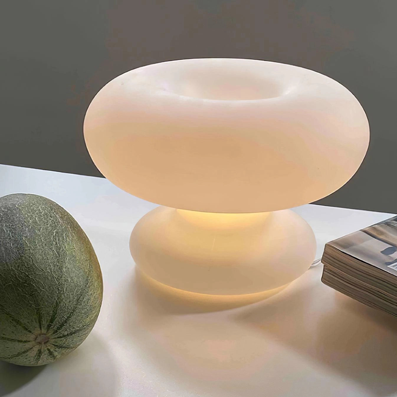 Modern Mushroom Table Lamp with a minimalist design featuring a rounded, wood-textured base and a smooth, dome-shaped lampshade.