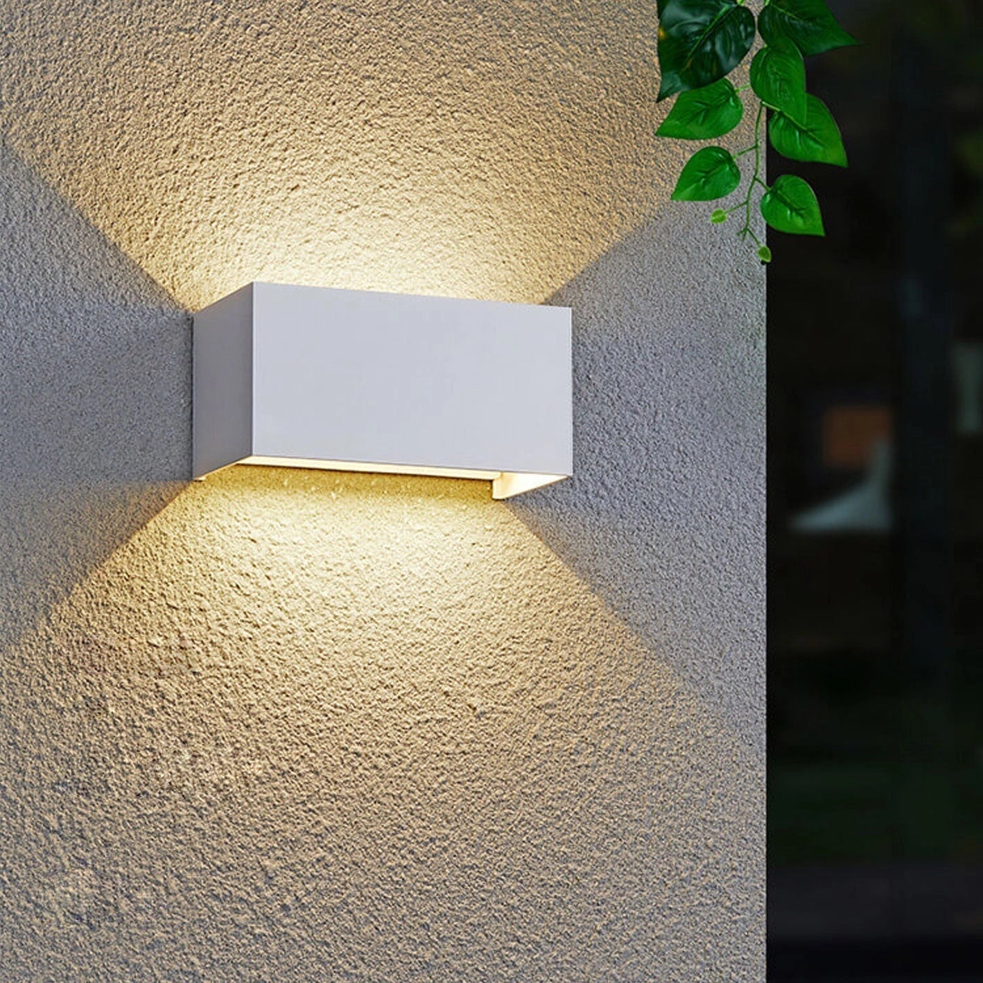 Modern rectangular LED outdoor wall light in black, designed to be weather-resistant, with a white variant offering 24W, white light at 5000K, suitable for 220 V-240 V systems in Great Britain and Australia, mounted against a concrete or wooden surface.