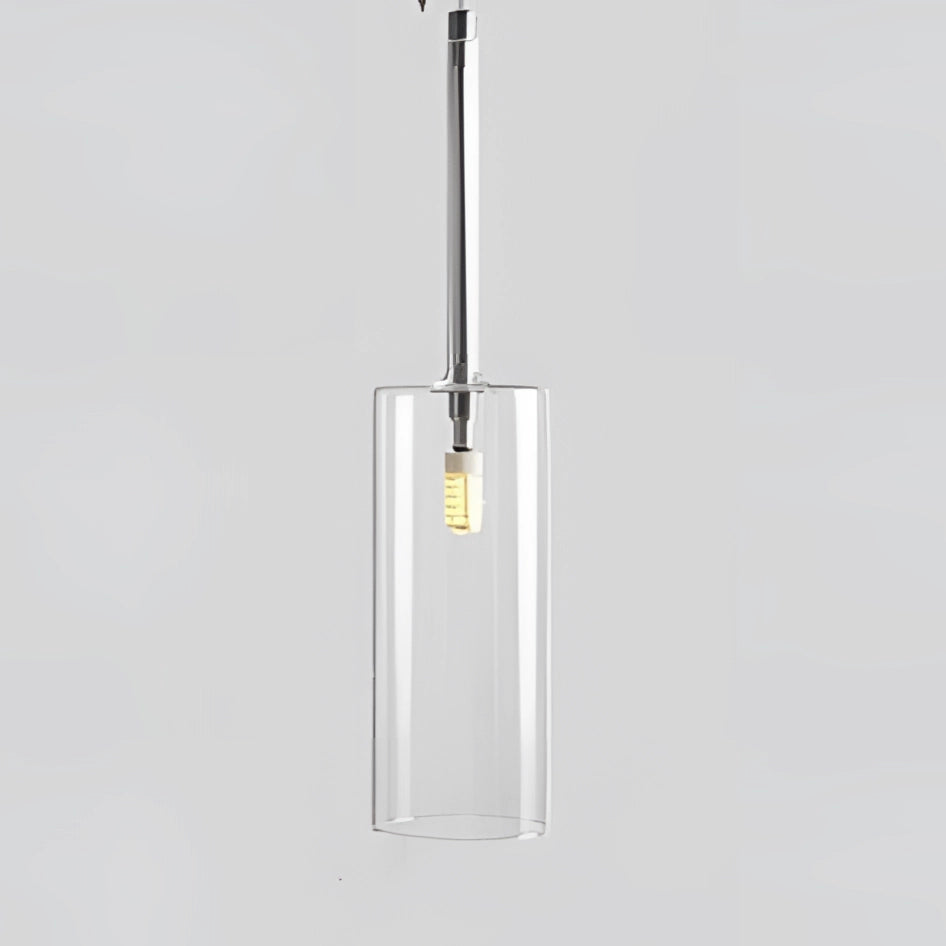 Transparent modern Scandinavian glass pendant light with a warm white glow, featuring a sleek rectangular design and metallic accents.