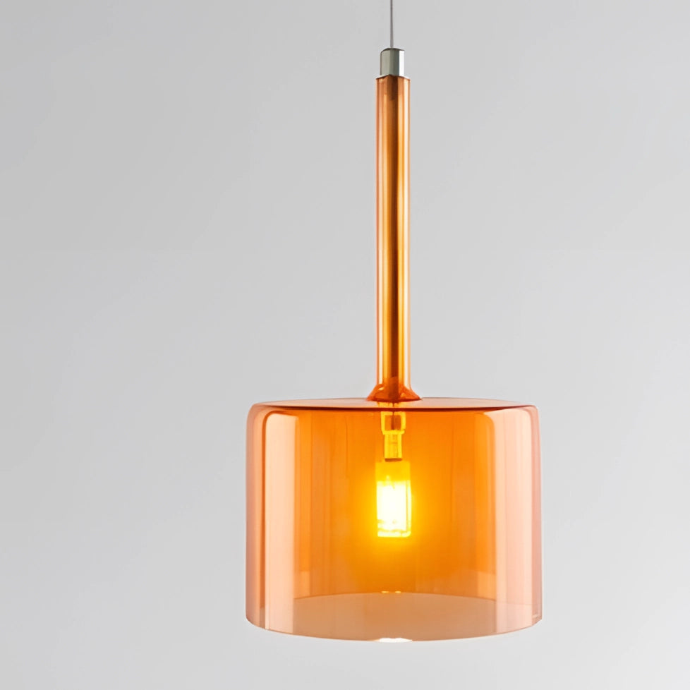 Modern Scandinavian glass pendant light with a warm white glow, featuring a C-shaped orange design. The ceiling fixture combines transparency with metal accents, creating a luxurious and contemporary aesthetic.