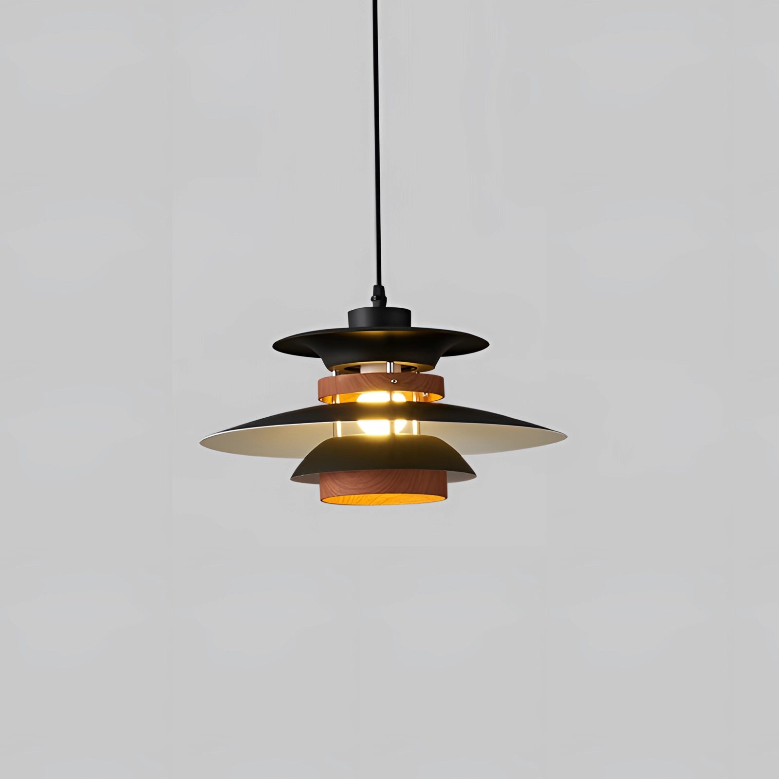 Modern Scandinavian LED pendant light with a minimalist wooden design in a large size, featuring a black finish with walnut grain accents and a 2-meter cord, hanging from the ceiling.