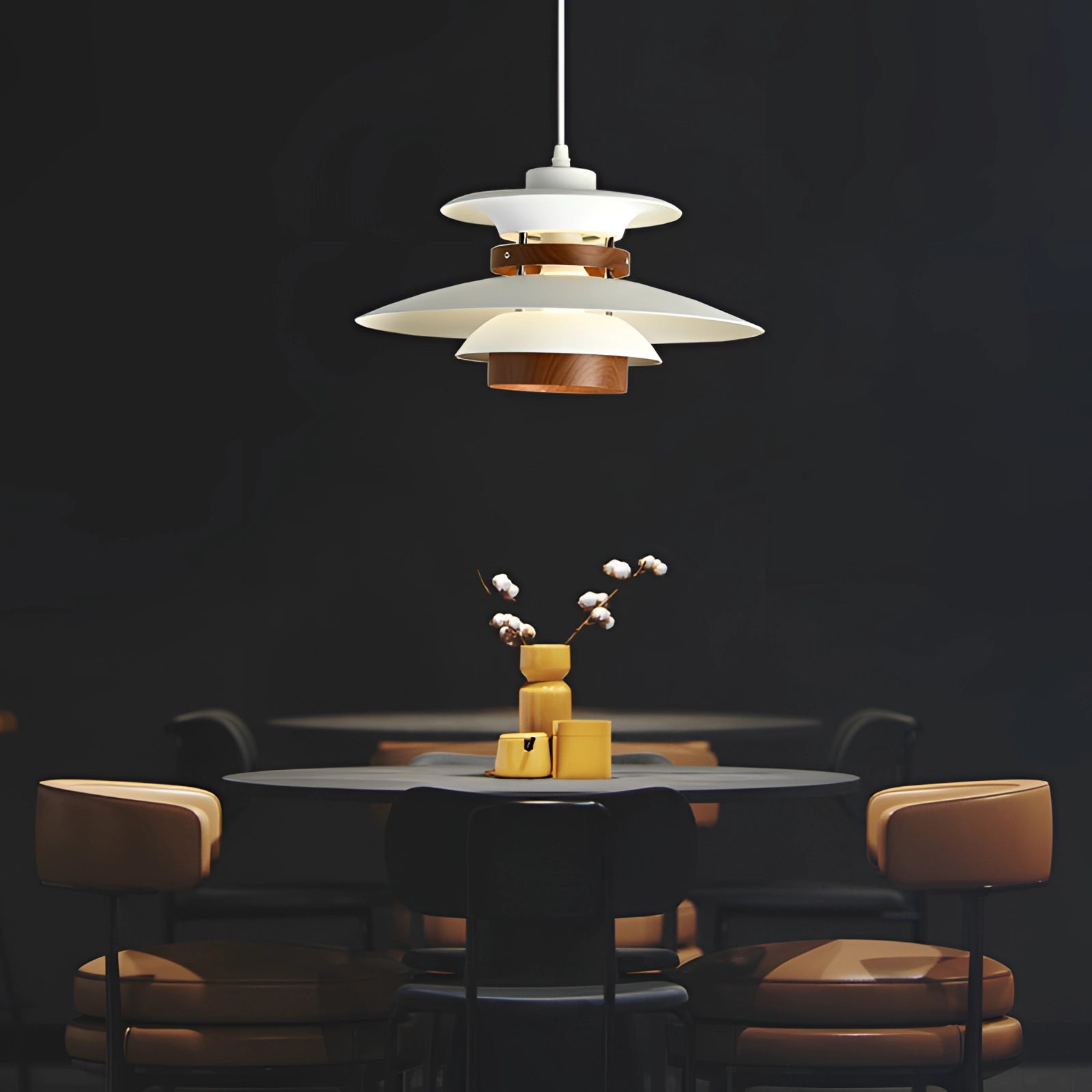 Modern Scandinavian LED pendant light with minimalist wooden design hanging above a kitchen and dining room table.