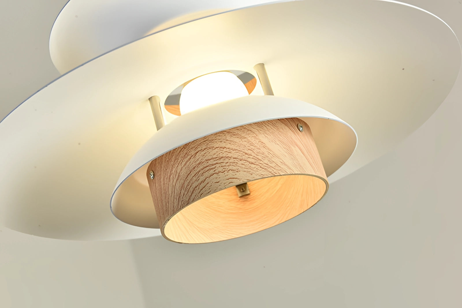 Modern Scandinavian LED pendant light with a minimalist wooden design hanging from the ceiling, featuring a circular lampshade and metal accents.