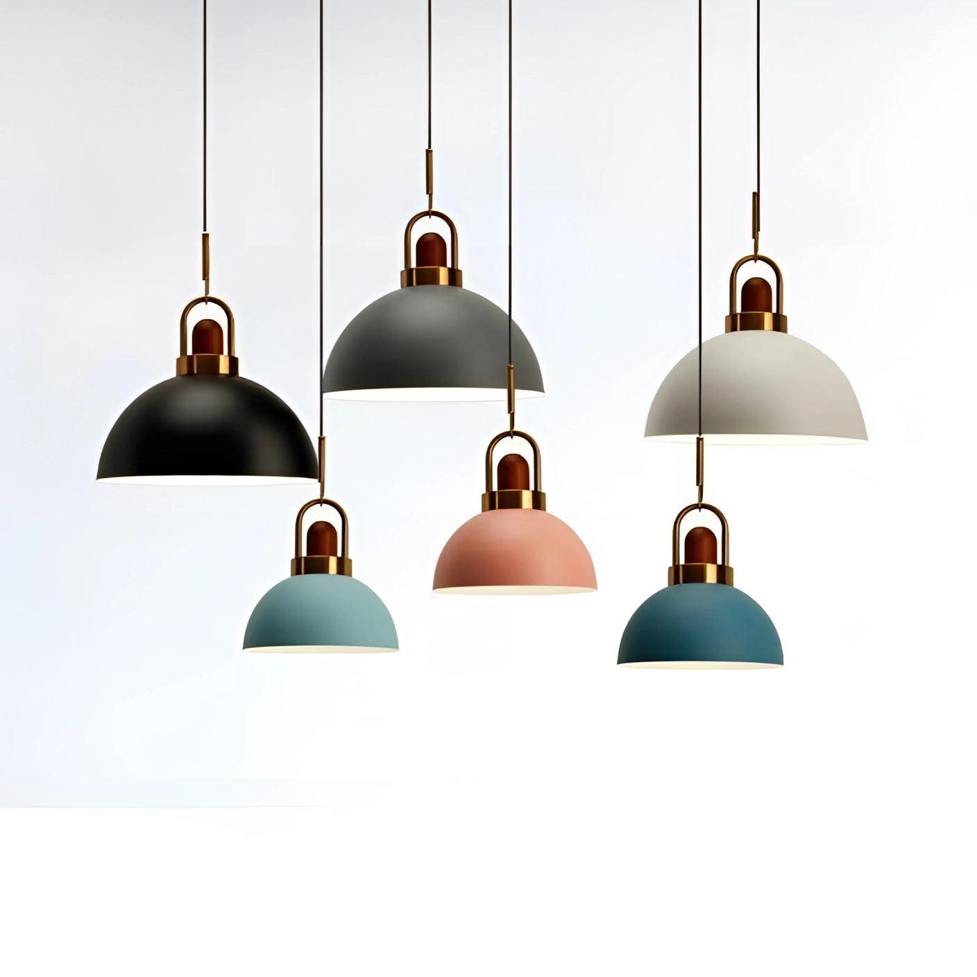 Modern Scandinavian matte pendant light fixture with copper accents, featuring a sleek and minimalist design. The fixture is suspended from the ceiling and showcases a circular shape, combining an elegant matte finish with sophisticated metallic elements. Ideal for adding a contemporary touch to any room.