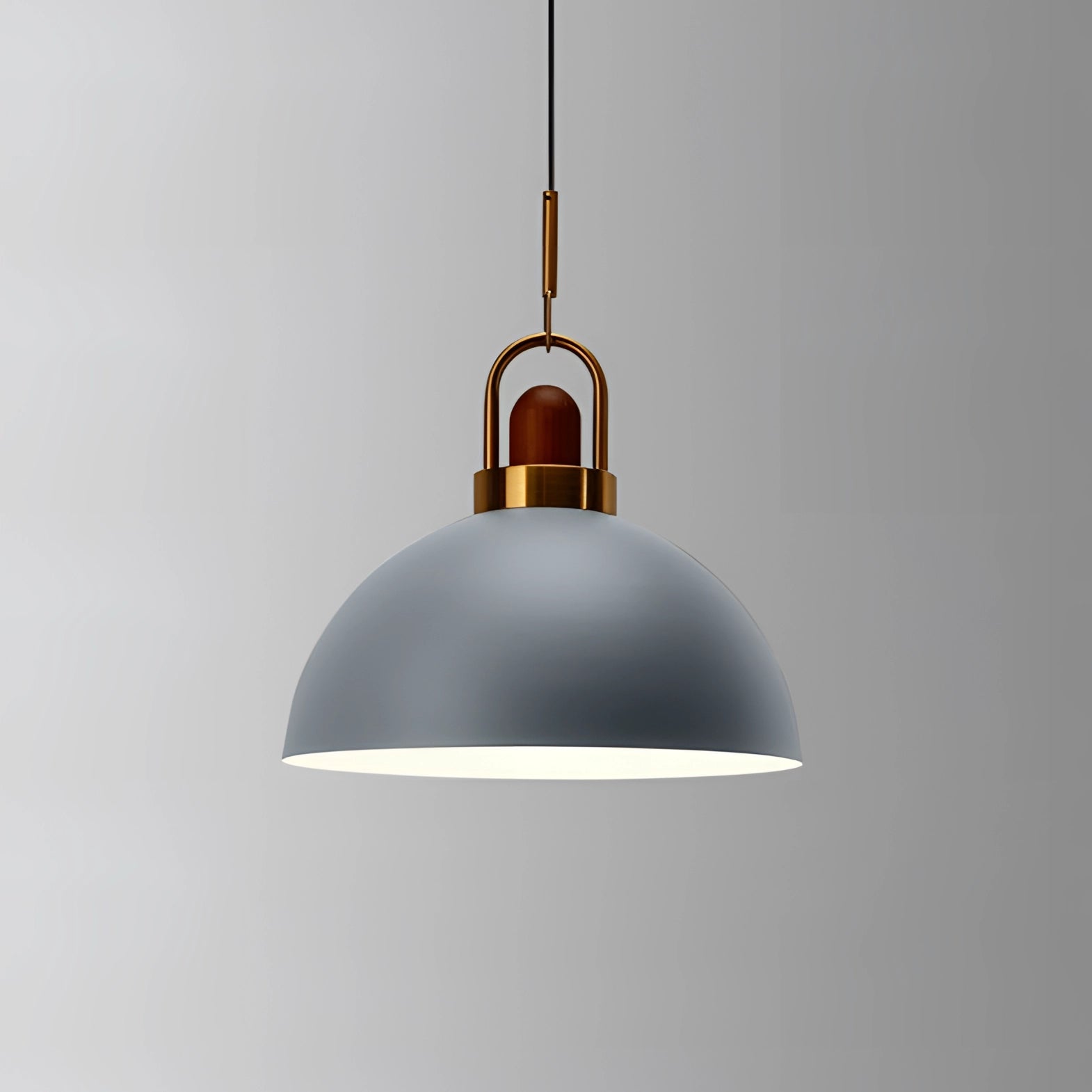 Modern Scandinavian matte pendant light with a gray finish, featuring a sleek copper accent. The ceiling fixture has a minimalist circular design, ideal for adding a contemporary touch to any space.