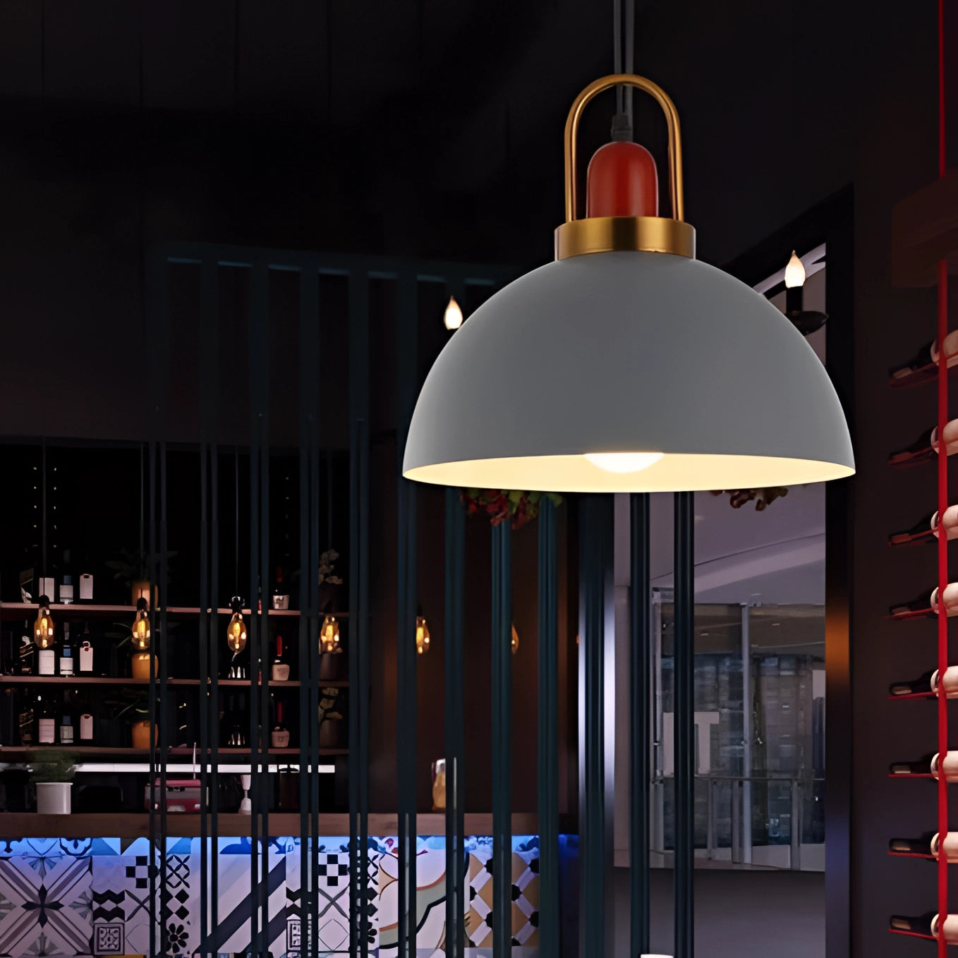 Modern Scandinavian matte pendant lights with copper accents hanging from the ceiling, illuminating a contemporary interior space. The lights have a sleek design that complements the surrounding modern decor.