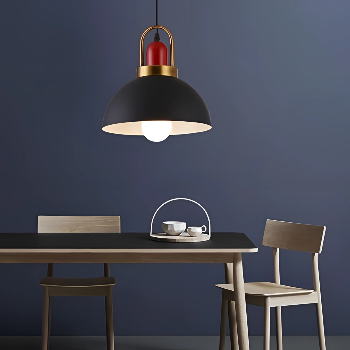 Modern Scandinavian matte pendant light with copper accents, featuring a sleek design hanging from the ceiling, illuminating a contemporary interior space with wooden elements.