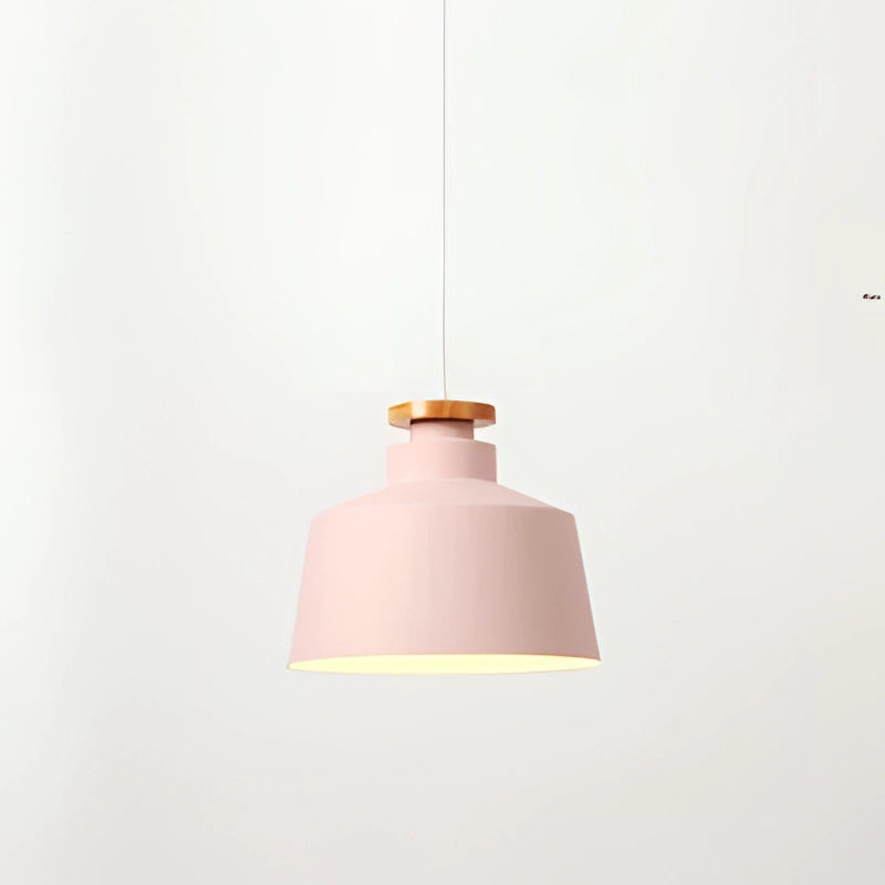 Pink modern Scandinavian pendant light with drum-shaped lampshade, adjustable height, and wooden accents.