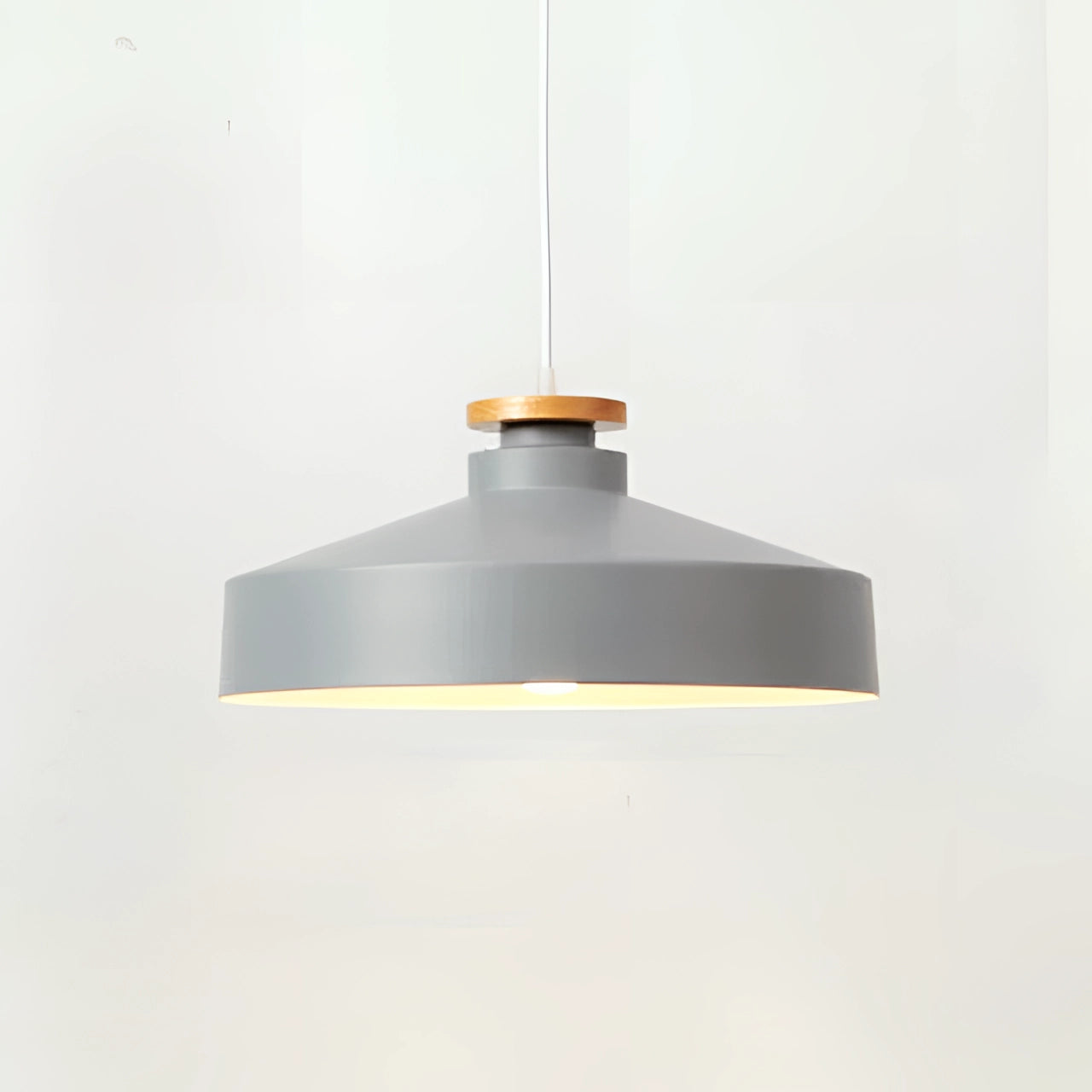 Modern Scandinavian pendant light fixture with a gray disk-shaped design, featuring adjustable height, and made of a combination of wood and metal materials suitable for ceiling installation.