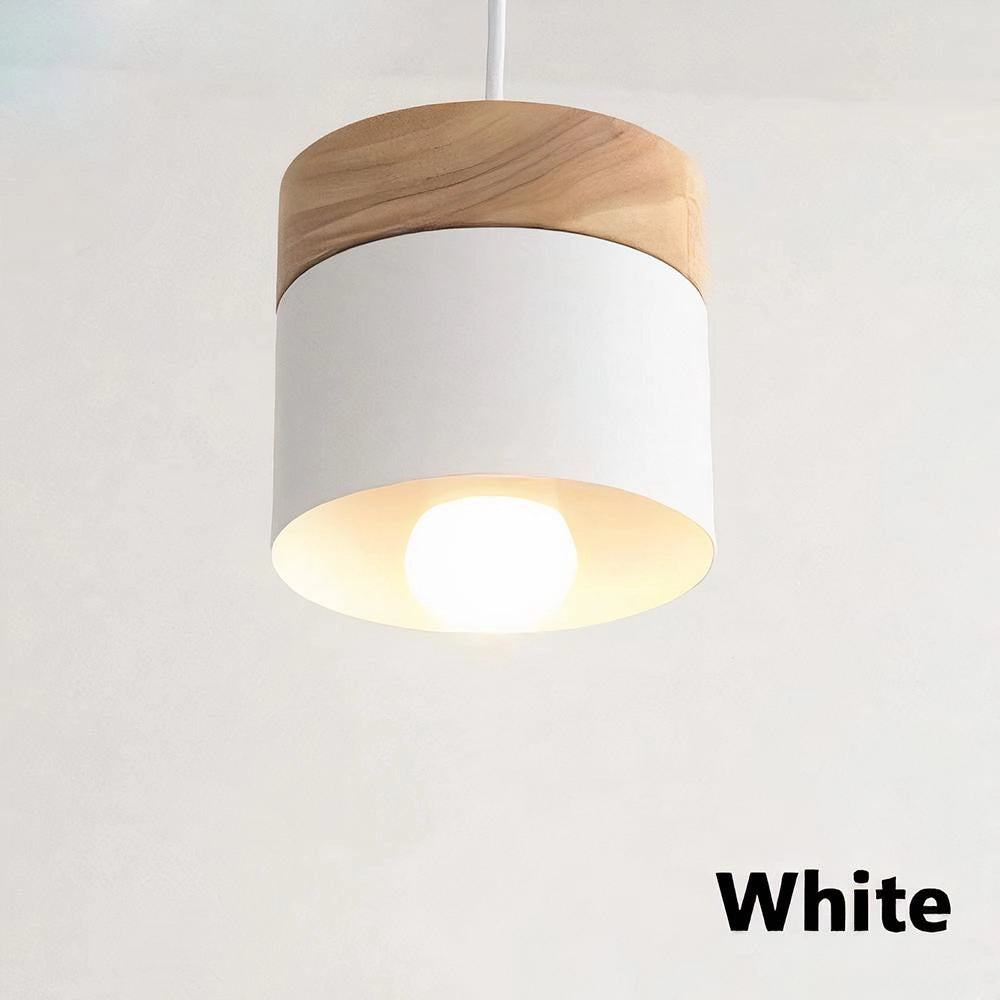 Modern Scandinavian wooden pendant light in white finish, featuring a minimalist design with a cylindrical wooden lampshade, hanging from the ceiling.