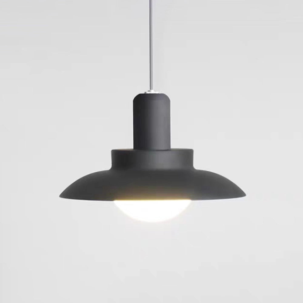 Modern white pendant light with a minimalist design, featuring an adjustable metal cone shade. The lamp is installed as a ceiling fixture, providing a sleek and contemporary lighting solution for kitchens or dining areas. The pendant light includes a bulb and is designed to hang from the ceiling, casting a soft, ambient glow.