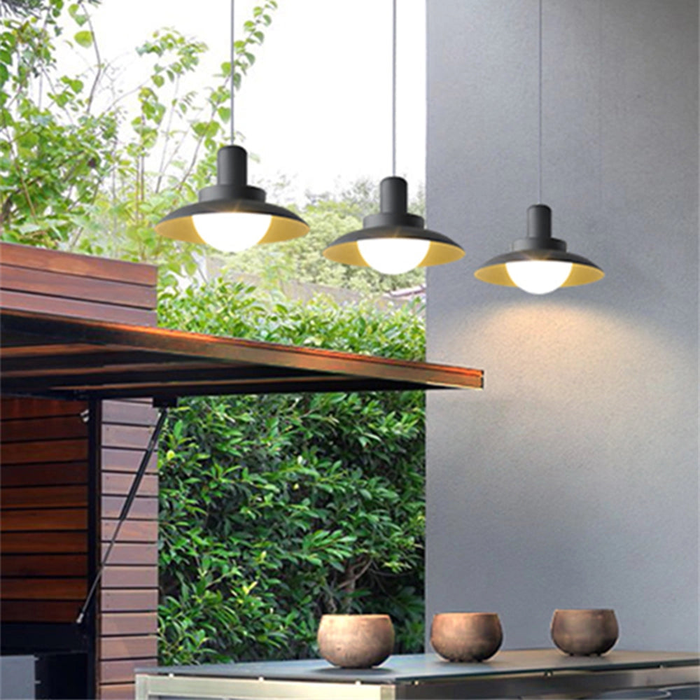 Modern white pendant light with a minimalist design, shown in gray with a 7.8" diameter. The lamp is suspended above a wooden table with plants nearby, set against a well-designed interior with neutral tones.