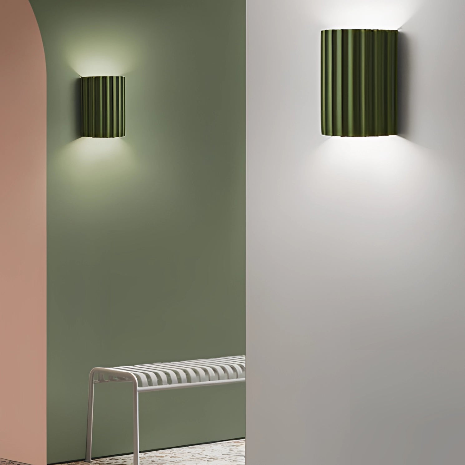 Modern white ribbed wall sconce with a rectangular shape and green accents, designed for contemporary indoor lighting, suitable for Great Britain/Australia with 220 V-240 V voltage. The sconce is mounted on a wall and features a sleek, minimalist design that complements modern interiors.