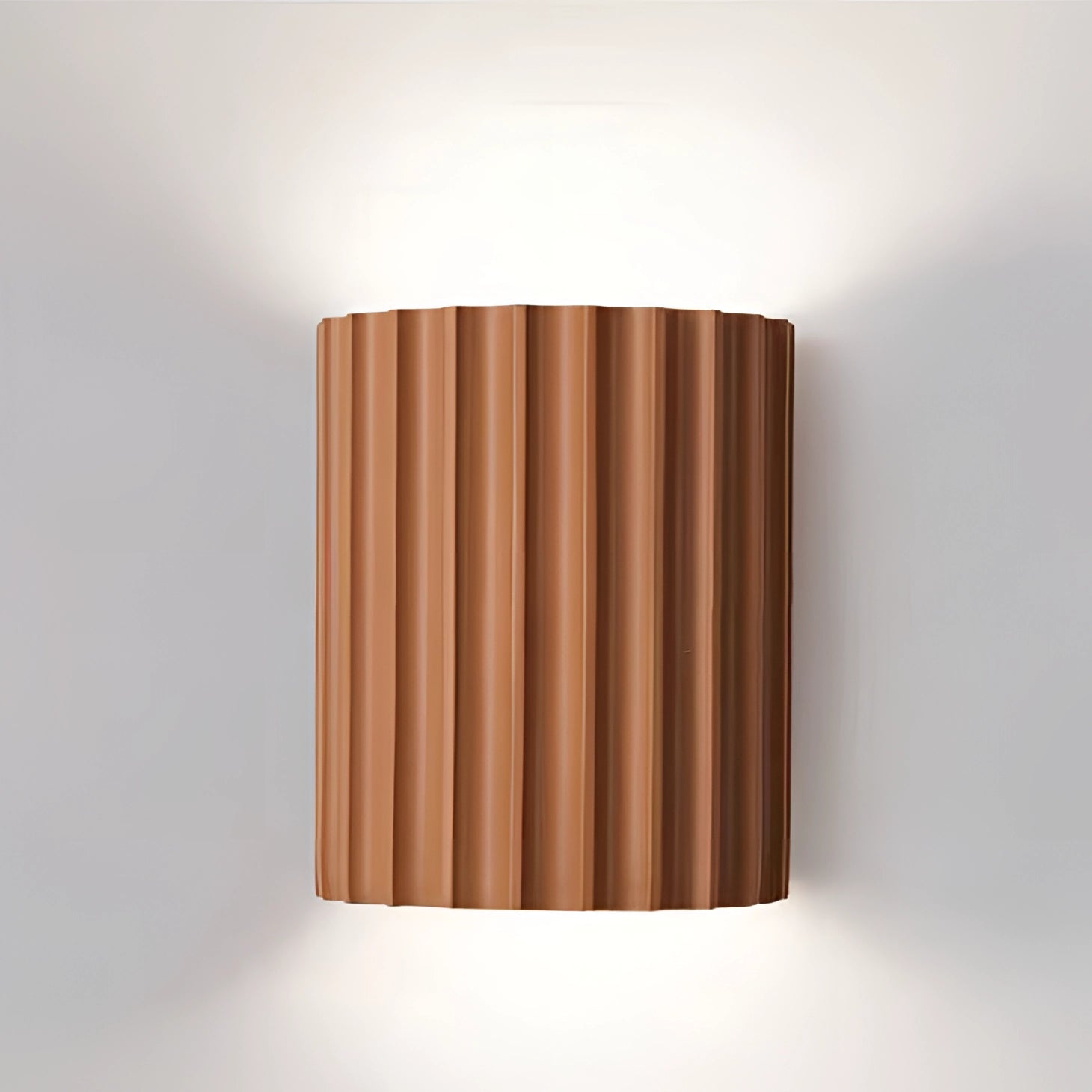 Modern white ribbed wall sconce with an orange tint, featuring a contemporary design made from metal and wood materials, suitable for indoor lighting in Great Britain or Australia, compatible with 220 V-240 V electrical systems.