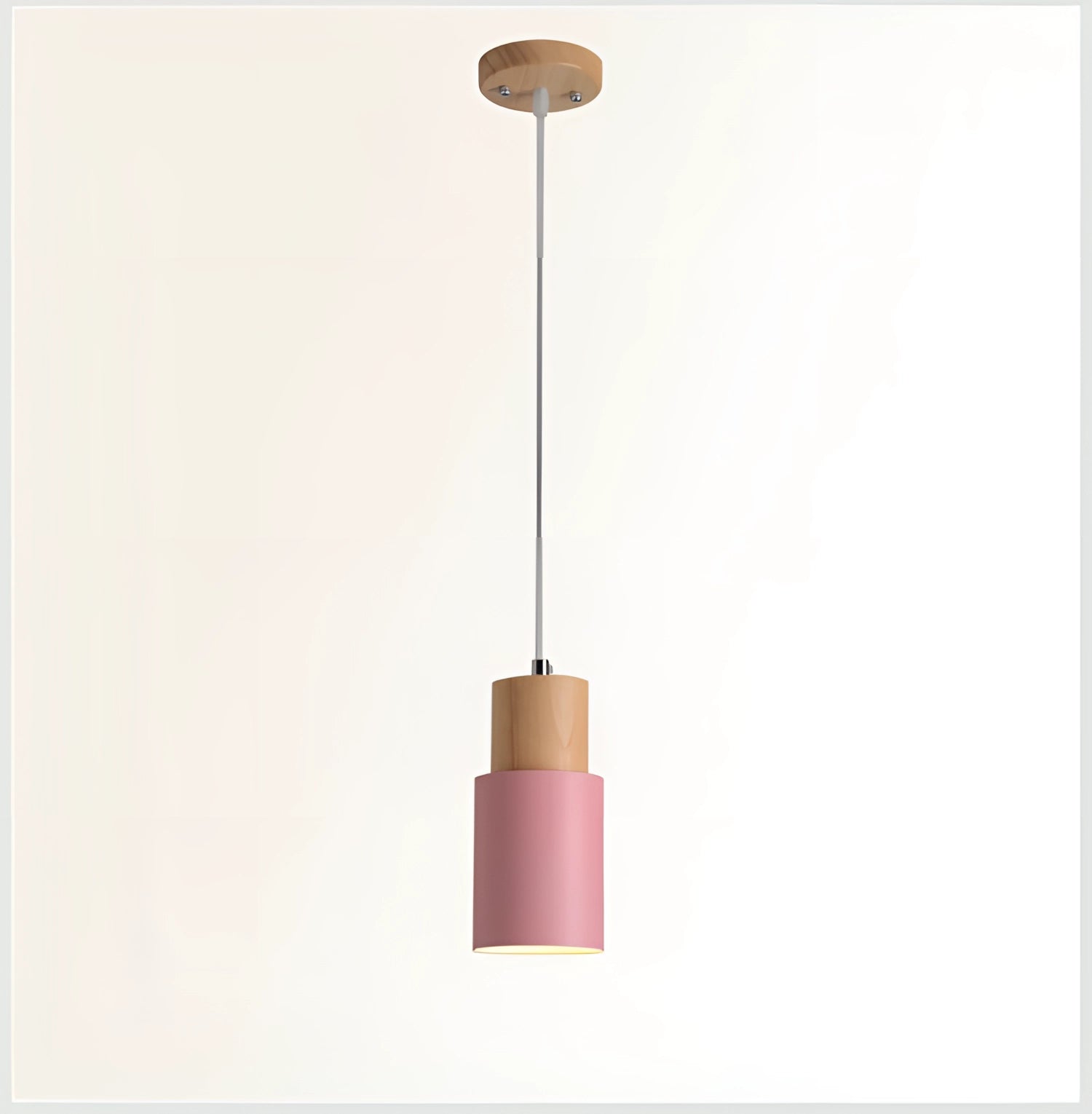 Nordic Modern Pendant Light with a pink shade and wood accent, designed in a Scandinavian style, hanging from the ceiling as a stylish and adjustable ceiling fixture.