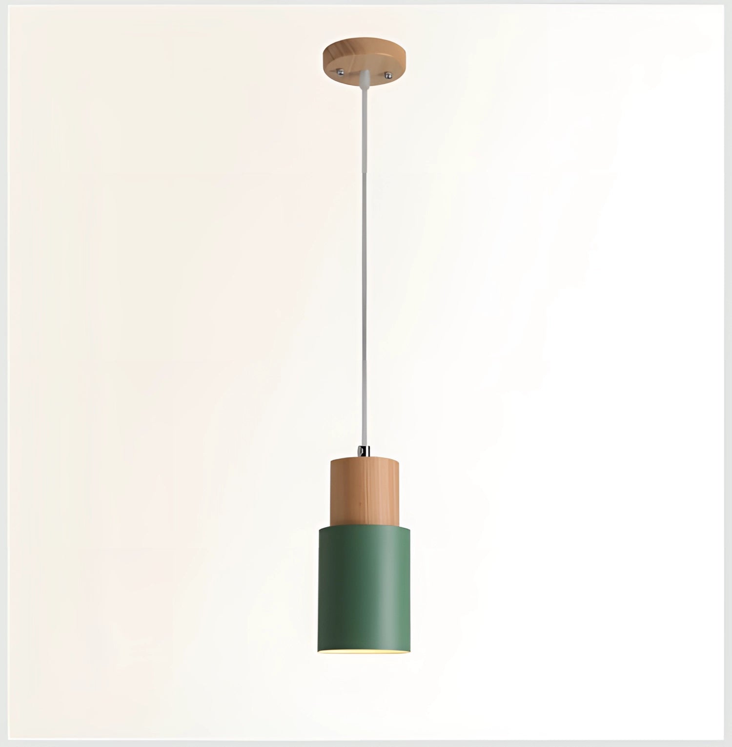 Nordic modern pendant light with a Scandinavian style design, featuring green accents, a wooden element, and an adjustable hanging cord; suitable for 220V-240V power in UK/AU settings, suspended from the ceiling.