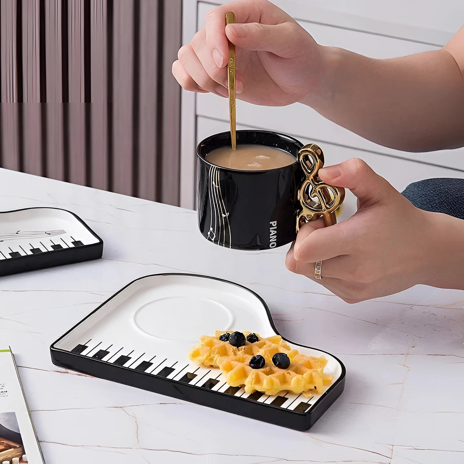 Black piano-themed pen holder shaped like a cup with a gold clip design and a keyboard tray, suitable for organizing office supplies.